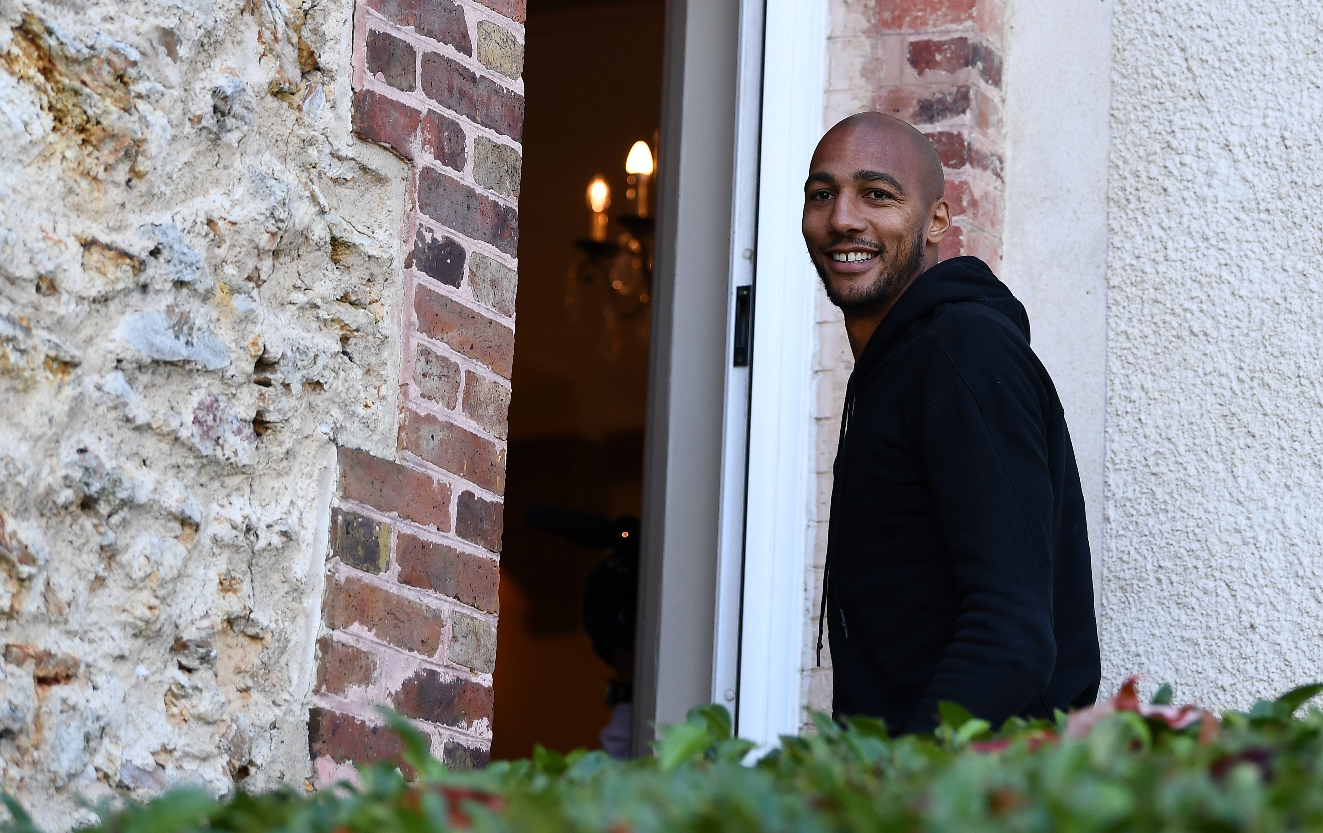 France's midfielder Steven Nzonzi  arrives in Clairefontaine en Yvelines on November 6, 2017, as part of the team's preparation for the friendly football match against Wales and Germany.  / AFP PHOTO / FRANCK FIFE        (Photo credit should read FRANCK FIFE/AFP/Getty Images)