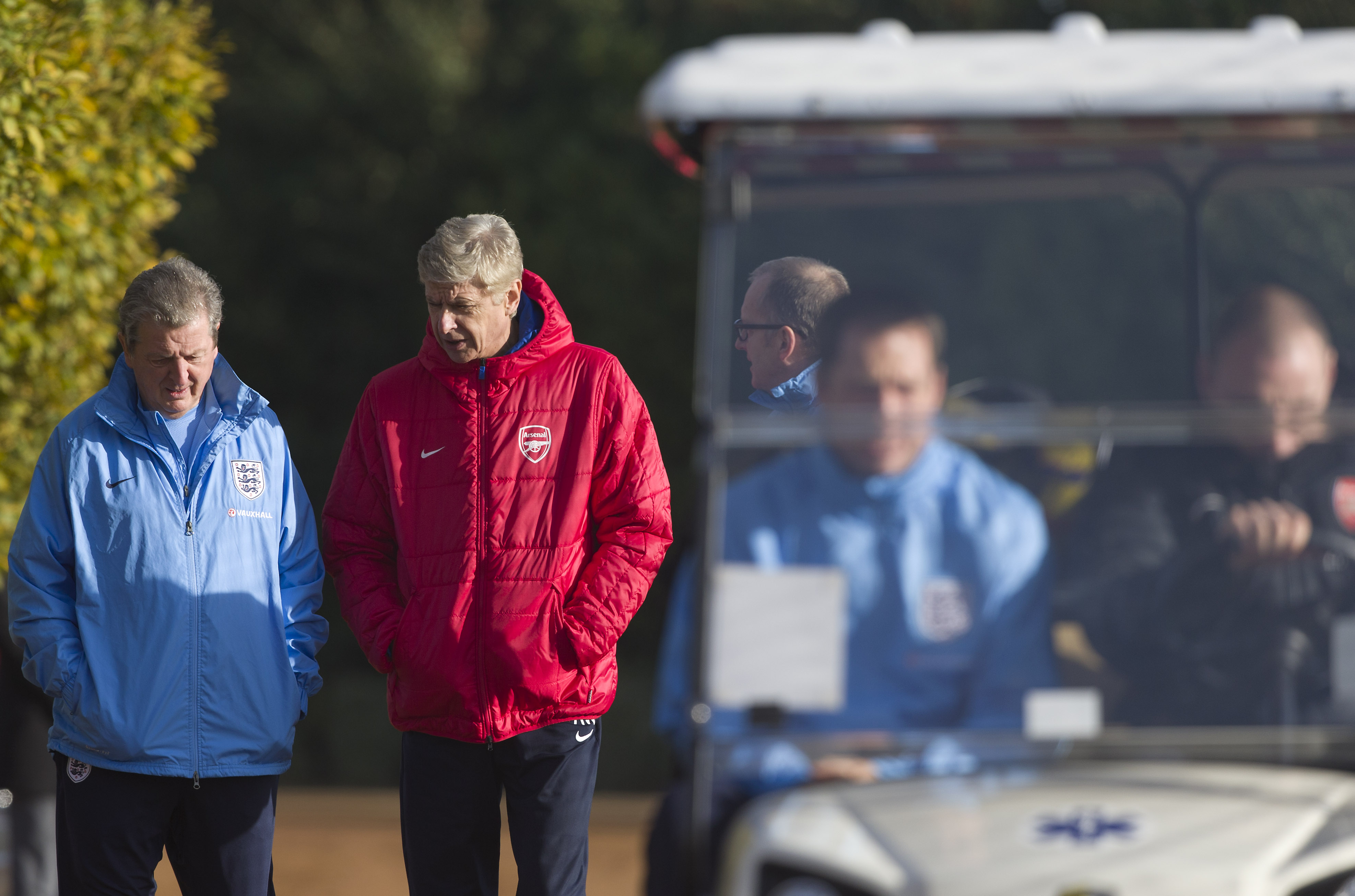 England manager Roy Hodgson (L) walk with Arsenal's French manager Arsene Wenger (R) ahead of an England training session at Arsenal's training ground, London Colney, north of London on November 13, 2013 ahead of their forthcoming international friendly football match against Chile. AFP PHOTO / JUSTIN TALLIS - NOT FOR MARKETING OR ADVERTISING USE / RESTRICTED TO EDITORIAL USE (Photo credit should read JUSTIN TALLIS/AFP/Getty Images)