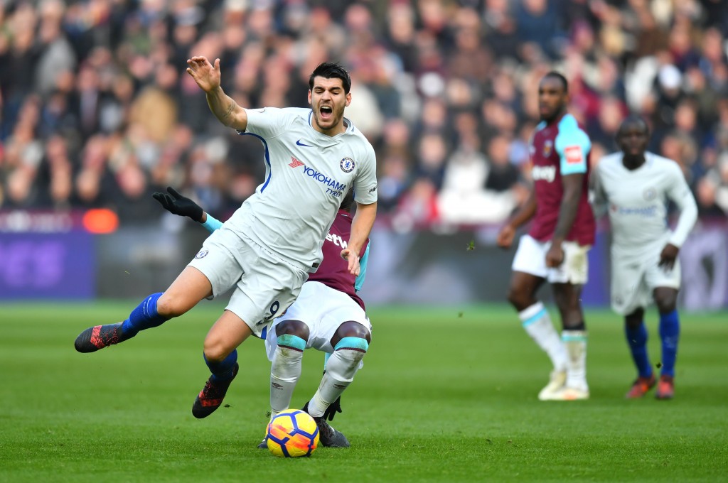 LONDON, ENGLAND - DECEMBER 09: Alvaro Morata of Chelsea is fouled by Pedro Obiang of West Ham United (obscure) during the Premier League match between West Ham United and Chelsea at London Stadium on December 9, 2017 in London, England. (Photo by Dan Mullan/Getty Images) *** Local Caption *** Alvaro Morata
