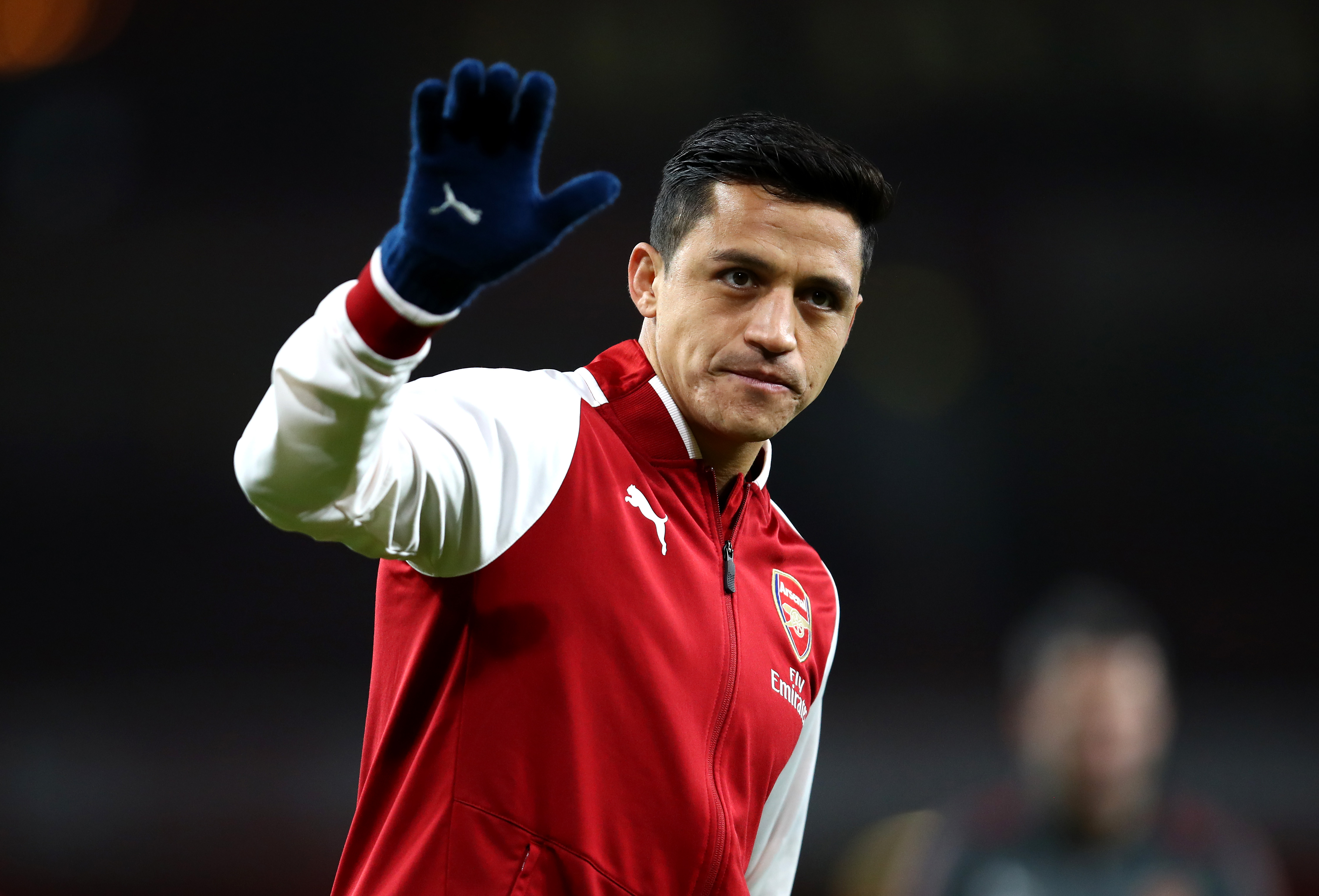 LONDON, ENGLAND - JANUARY 03: Alexis Sanchez of Arsenal warms up prior to the Premier League match between Arsenal and Chelsea at Emirates Stadium on January 3, 2018 in London, England. (Photo by Julian Finney/Getty Images)