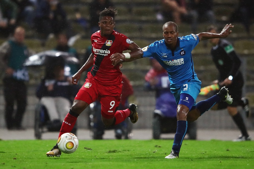 KARLSRUHE, GERMANY - AUGUST 11: Leon Bailey of Leverkusen eludes David Pisot of Karlsruhe during the DFB Cup first round match between Karlsruher SC and Bayer Leverkusen at Wildparkstadion on August 11, 2017 in Karlsruhe, Germany. (Photo by Alex Grimm/Bongarts/Getty Images)