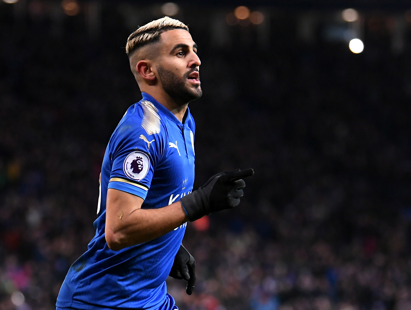 LEICESTER, ENGLAND - JANUARY 20: Riyad Mahrez of Leicester City celebrates scoring his side's second goal during the Premier League match between Leicester City and Watford at The King Power Stadium on January 20, 2018 in Leicester, England. (Photo by Laurence Griffiths/Getty Images)