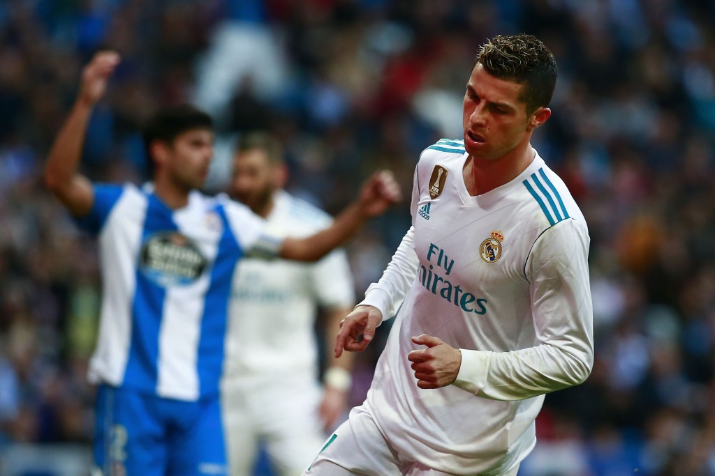 MADRID, SPAIN - JANUARY 21: Cristiano Ronaldo of Real Madrid CF celebrates scoring their fifth goal during the La Liga match between Real Madrid CF and Deportivo La Coruna at Estadio Santiago Bernabeu on January 21, 2018 in Madrid, Spain. (Photo by Gonzalo Arroyo Moreno/Getty Images)