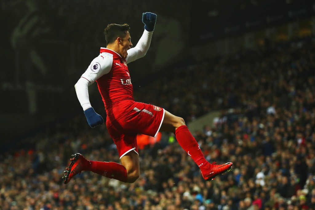 Alexis after scoring a late goal against West Brom in the Premier League. (Photo courtesy: AFP/Getty)