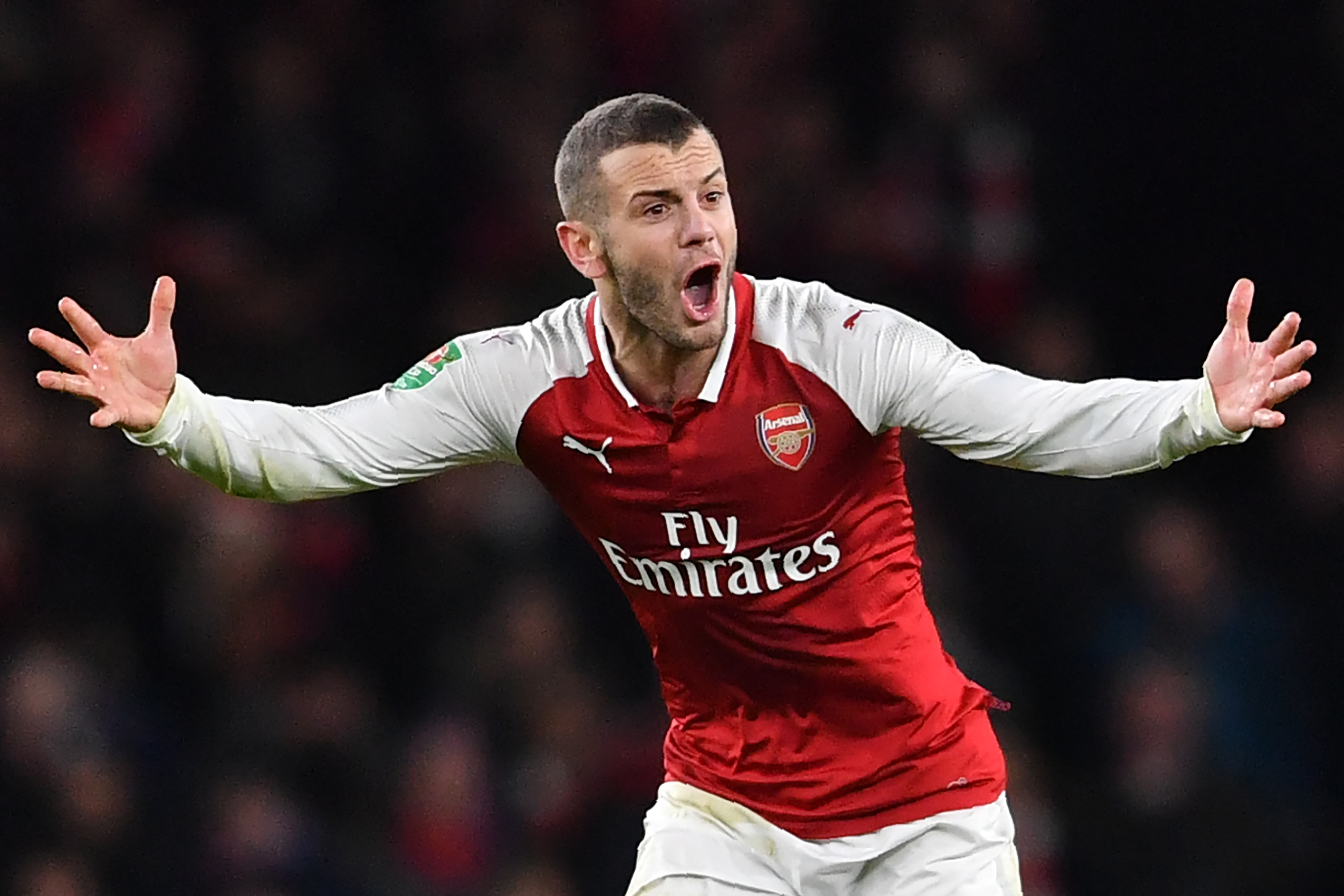 Arsenal's English midfielder Jack Wilshere reacts during the League Cup semi-final football match between Arsenal and Chelsea at the Emirates Stadium in London on January 24, 2018.  / AFP PHOTO / Ben STANSALL / RESTRICTED TO EDITORIAL USE. No use with unauthorized audio, video, data, fixture lists, club/league logos or 'live' services. Online in-match use limited to 75 images, no video emulation. No use in betting, games or single club/league/player publications.  /         (Photo credit should read BEN STANSALL/AFP/Getty Images)