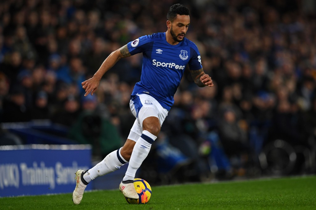 Everton's English striker Theo Walcott runs with the ball during the English Premier League football match between Everton and Leicester City at Goodison Park in Liverpool, north west England on January 31, 2018. / AFP PHOTO / Paul ELLIS / RESTRICTED TO EDITORIAL USE. No use with unauthorized audio, video, data, fixture lists, club/league logos or 'live' services. Online in-match use limited to 75 images, no video emulation. No use in betting, games or single club/league/player publications. / (Photo credit should read PAUL ELLIS/AFP/Getty Images)