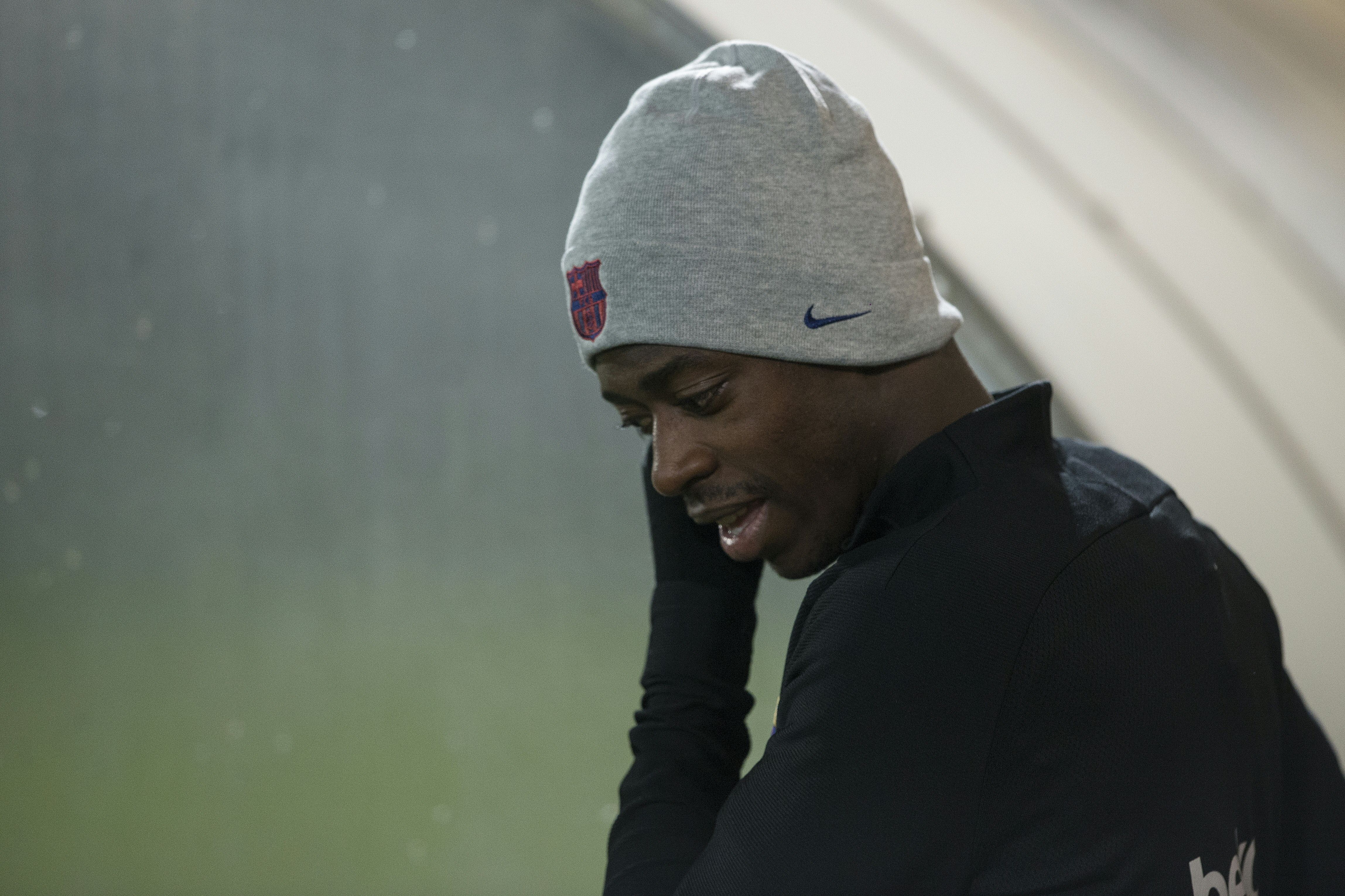 Barcelona's French forward Ousmane Dembele looks on during a training session at the FC Barcelona Joan Gamper sports center in Sant Joan Despi, near Barcelona, on December 9, 2017. / AFP PHOTO / Josep LAGO (Photo credit should read JOSEP LAGO/AFP/Getty Images)