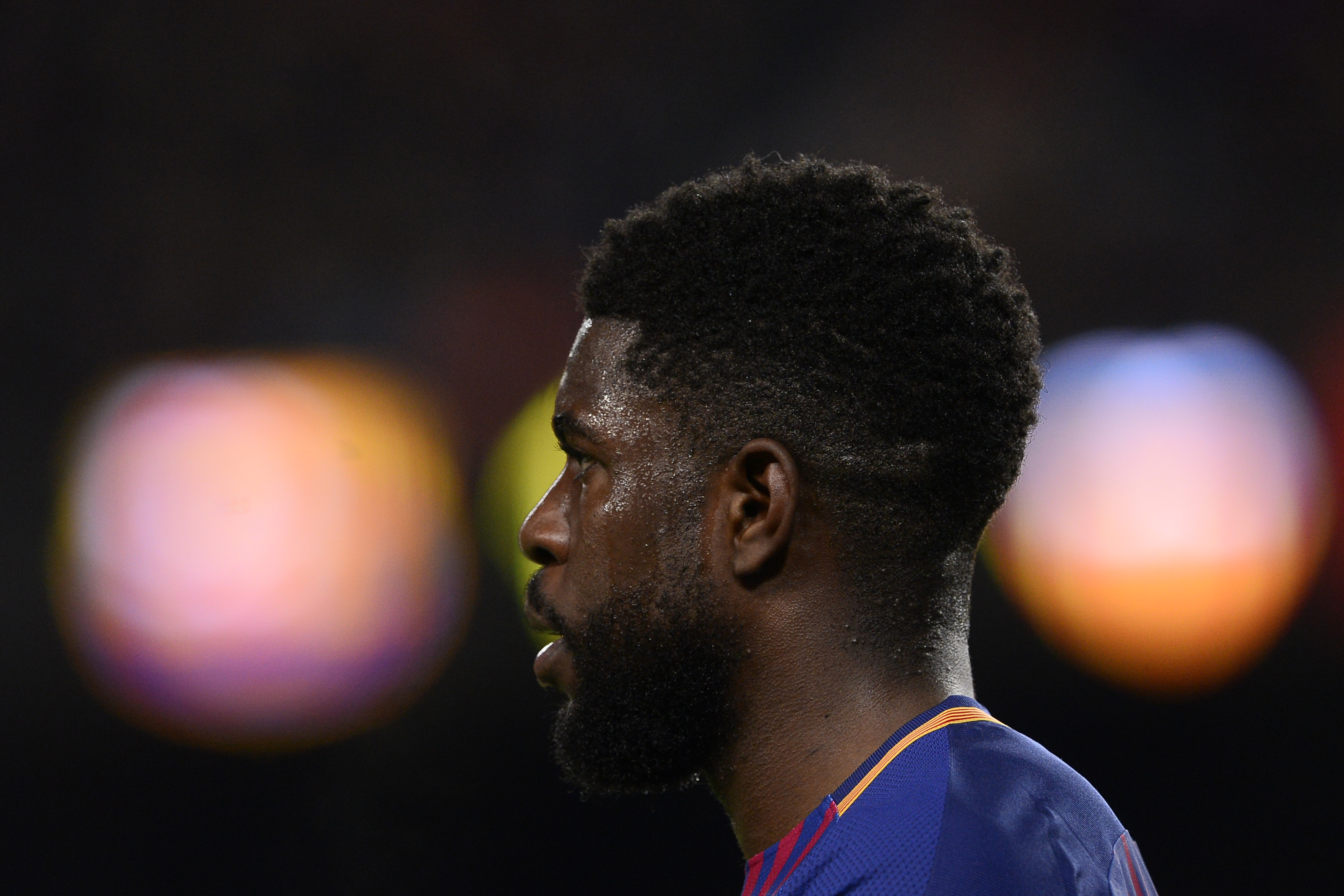 Barcelona's French defender Samuel Umtiti reacts during the Spanish 'Copa del Rey' (King's cup) first leg semi-final football match between FC Barcelona and Valencia CF at the Camp Nou stadium in Barcelona on February 01, 2018. / AFP PHOTO / Josep LAGO (Photo credit should read JOSEP LAGO/AFP/Getty Images)