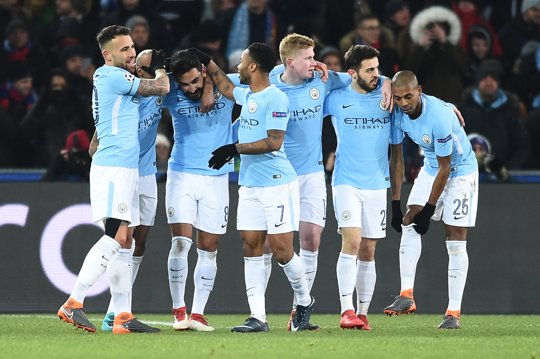 Manchester City's German midfielder Ilkay Gundogan (3rd L) celebrates with teammates after scoring his second goal during the UEFA Champions League round of 16 first leg football match between Basel and Manchester City at the Saint Jakob-Park Stadium in Basel on February 13, 2018. / AFP PHOTO / SEBASTIEN BOZON        (Photo credit should read SEBASTIEN BOZON/AFP/Getty Images)