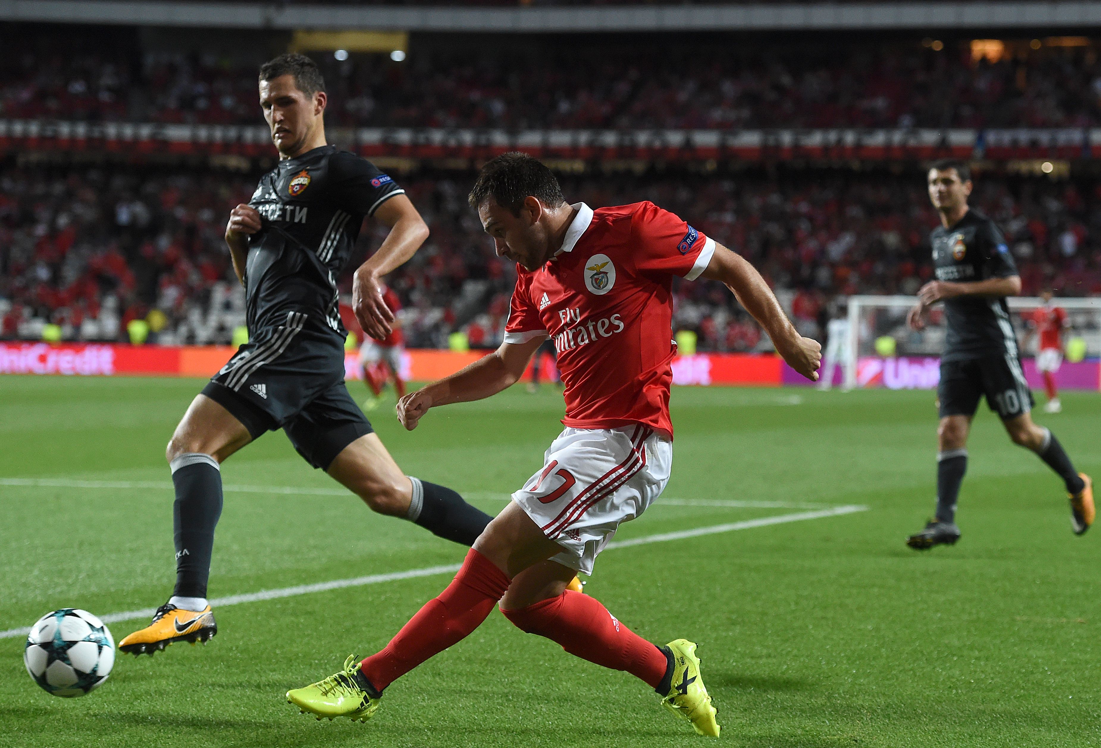 Benfica's Serb forward Andrija Zivkovic (C) vies with CSKA's defender Viktot Vasin (L) during the UEFA Champions League Group A football match SL Benfica vs CSKA Moscow at the Luz stadium in Lisbon, on September 12, 2017.  / AFP PHOTO / FRANCISCO LEONG        (Photo credit should read FRANCISCO LEONG/AFP/Getty Images)