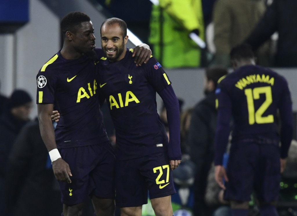 Tottenham Hotspur's Colombian defender Davinson Sanchez (L) embraces teammate Tottenham Hotspur's Brazilian midfielder Lucas after the UEFA Champions League round of sixteen first leg football match between Juventus and Tottenham Hotspur at The Allianz Stadium in Turin on February 13, 2018. / AFP PHOTO / Miguel MEDINA (Photo credit should read MIGUEL MEDINA/AFP/Getty Images)