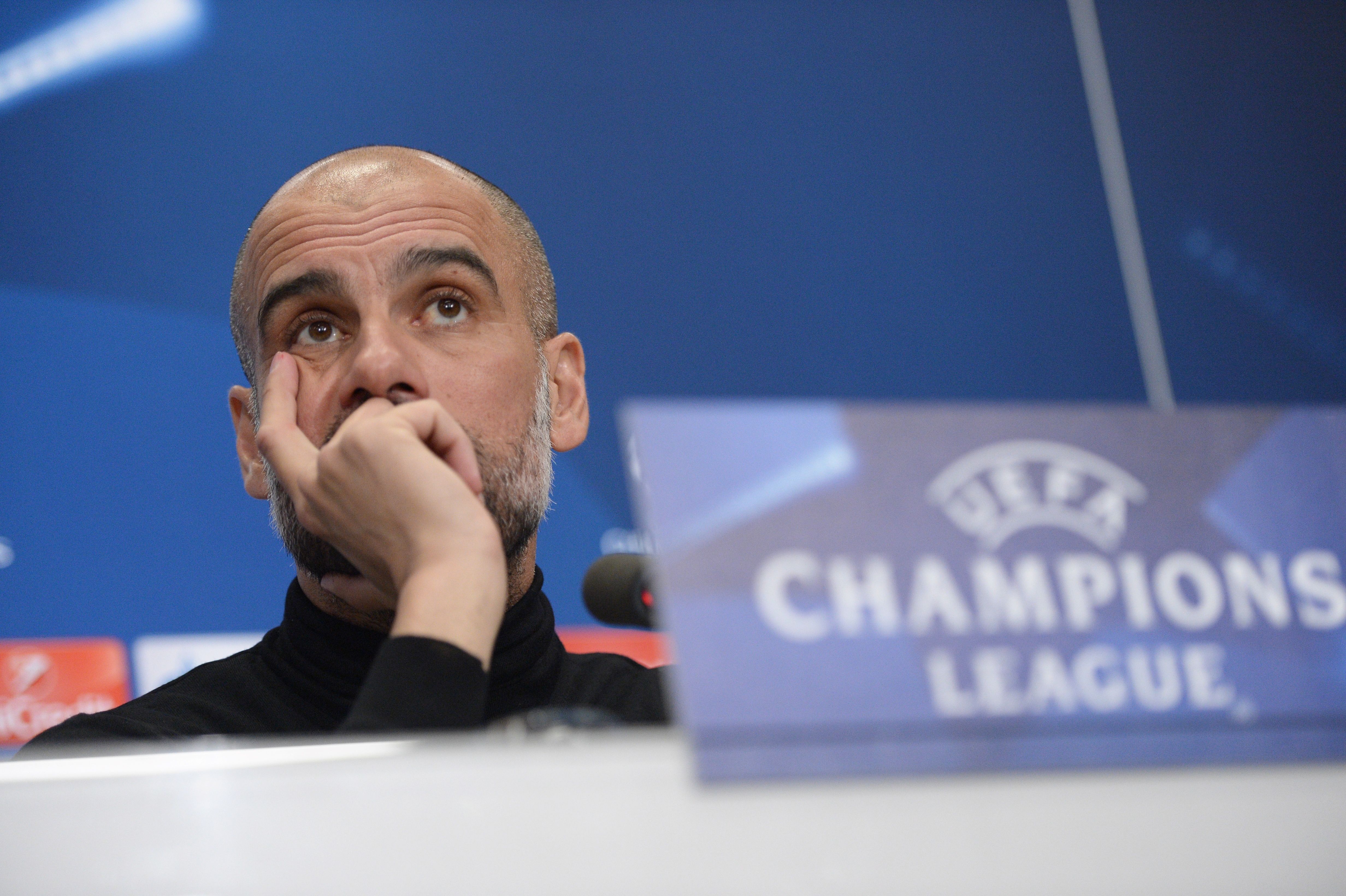Manchester City's Spanish coach Pep Guardiola holds a press conference on February 12, 2018, in Basel, on the eve of the UEFA Champions League round of 16 football between Basel and Manchester City. / AFP PHOTO / SEBASTIEN BOZON (Photo credit should read SEBASTIEN BOZON/AFP/Getty Images)