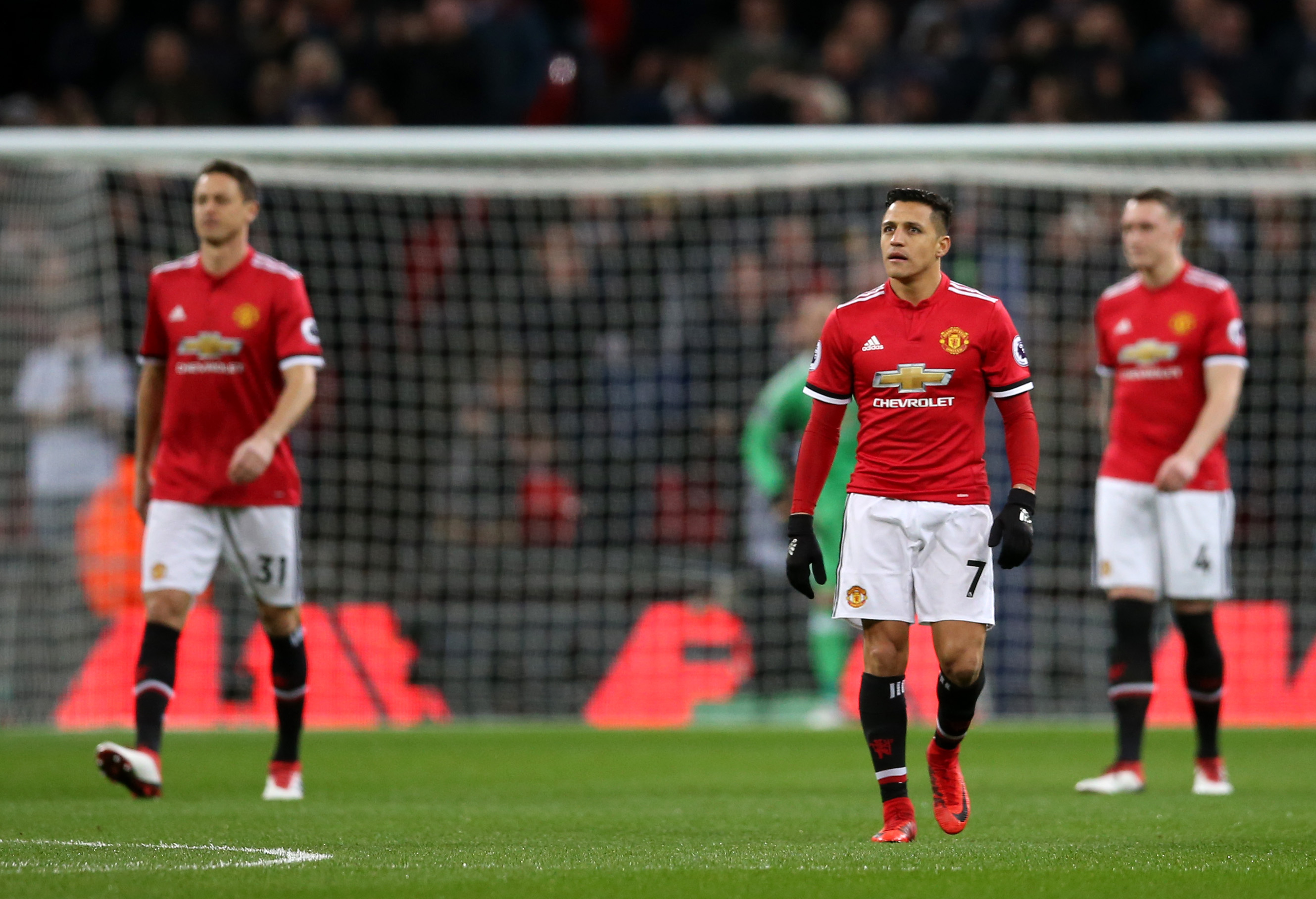LONDON, ENGLAND - JANUARY 31: Alexis Sanchez of Manchester United look dejected after Tottenham Hotspur first goal during the Premier League match between Tottenham Hotspur and Manchester United at Wembley Stadium on January 31, 2018 in London, England. (Photo by Steve Bardens/Getty Images)