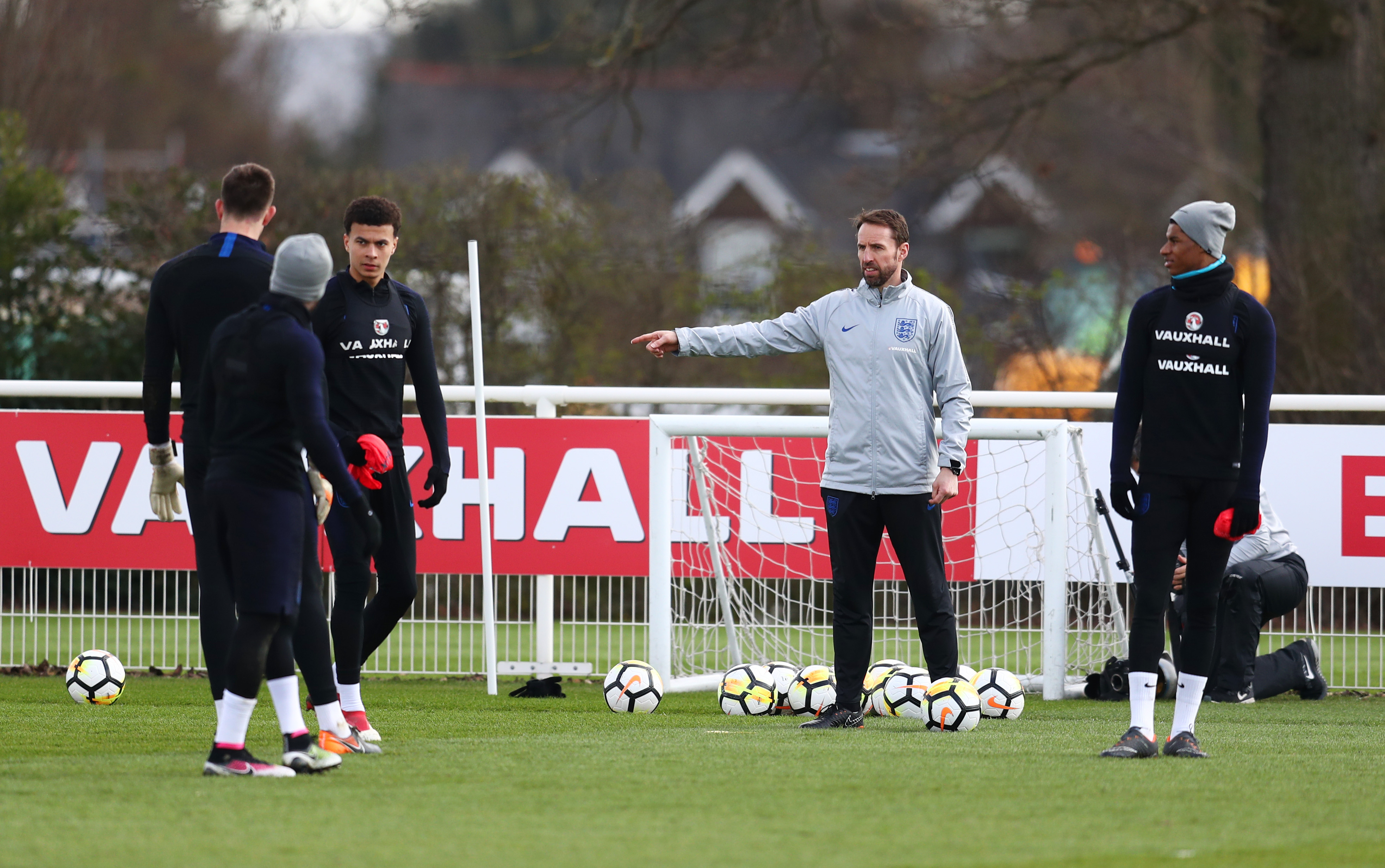 ENFIELD, ENGLAND - MARCH 26: Gareth Southgate manager of England talks to players during an England training session, on the eve of their international friendly against Italy at Tottenham Hotspur Training Centre, on March 26, 2018 in Enfield, England. (Photo by Catherine Ivill/Getty Images)