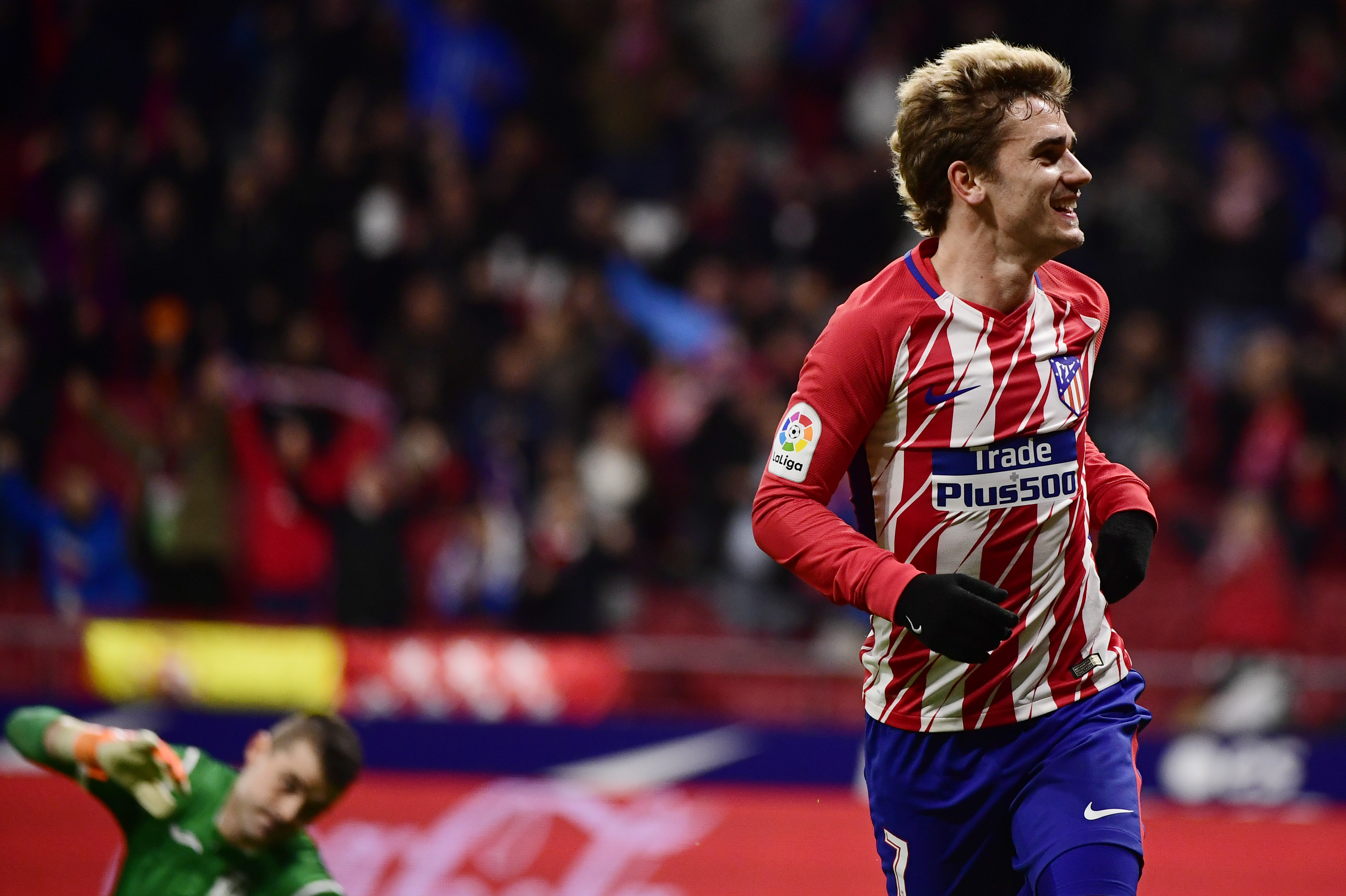 The smile is back, and so is the red hot form. (Photo courtesy - Pierre-Philippe Marcou/AFP/Getty Images)