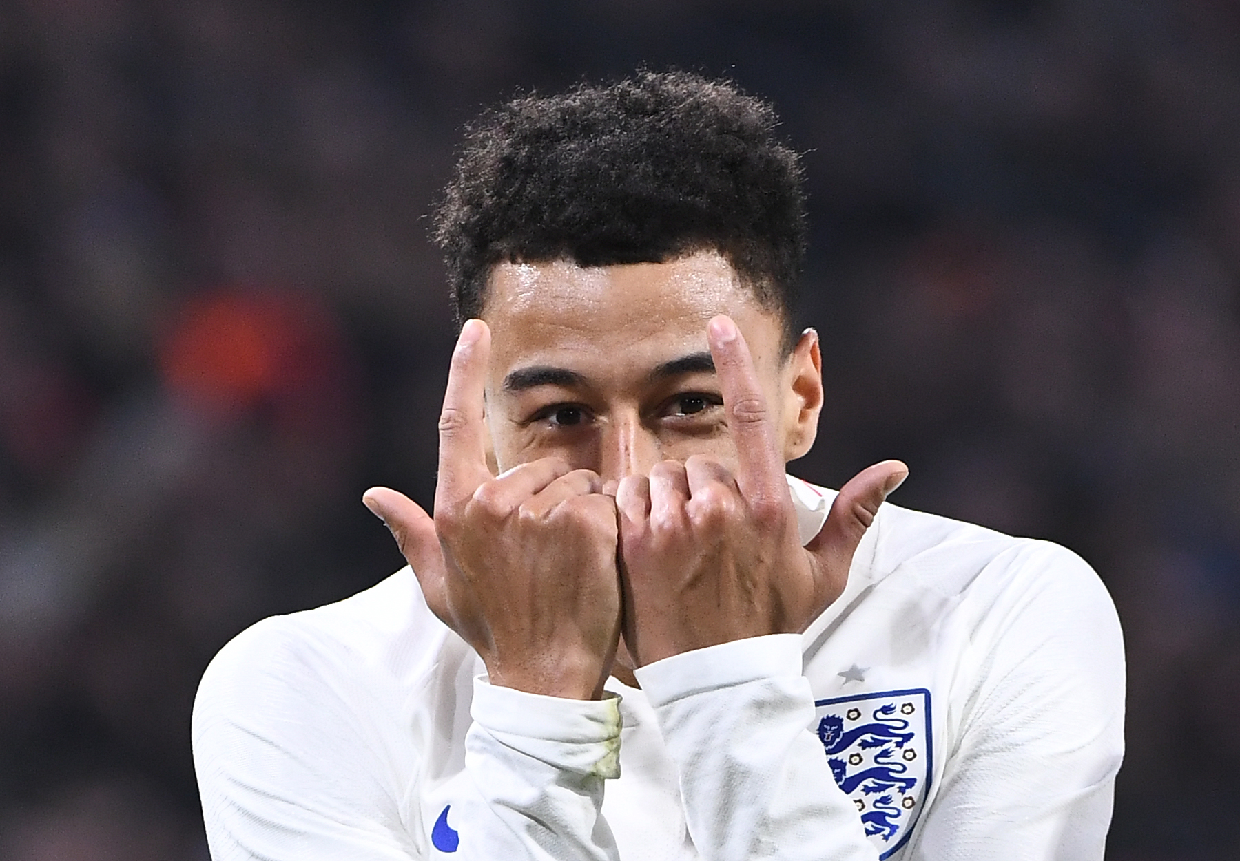 English player Jesse Lingard celebrates after scoring during a friendly football match between the Netherlands and England at the Amsterdam Arena in Amsterdam on March 23, 2018. / AFP PHOTO / Emmanuel DUNAND (Photo credit should read EMMANUEL DUNAND/AFP/Getty Images)