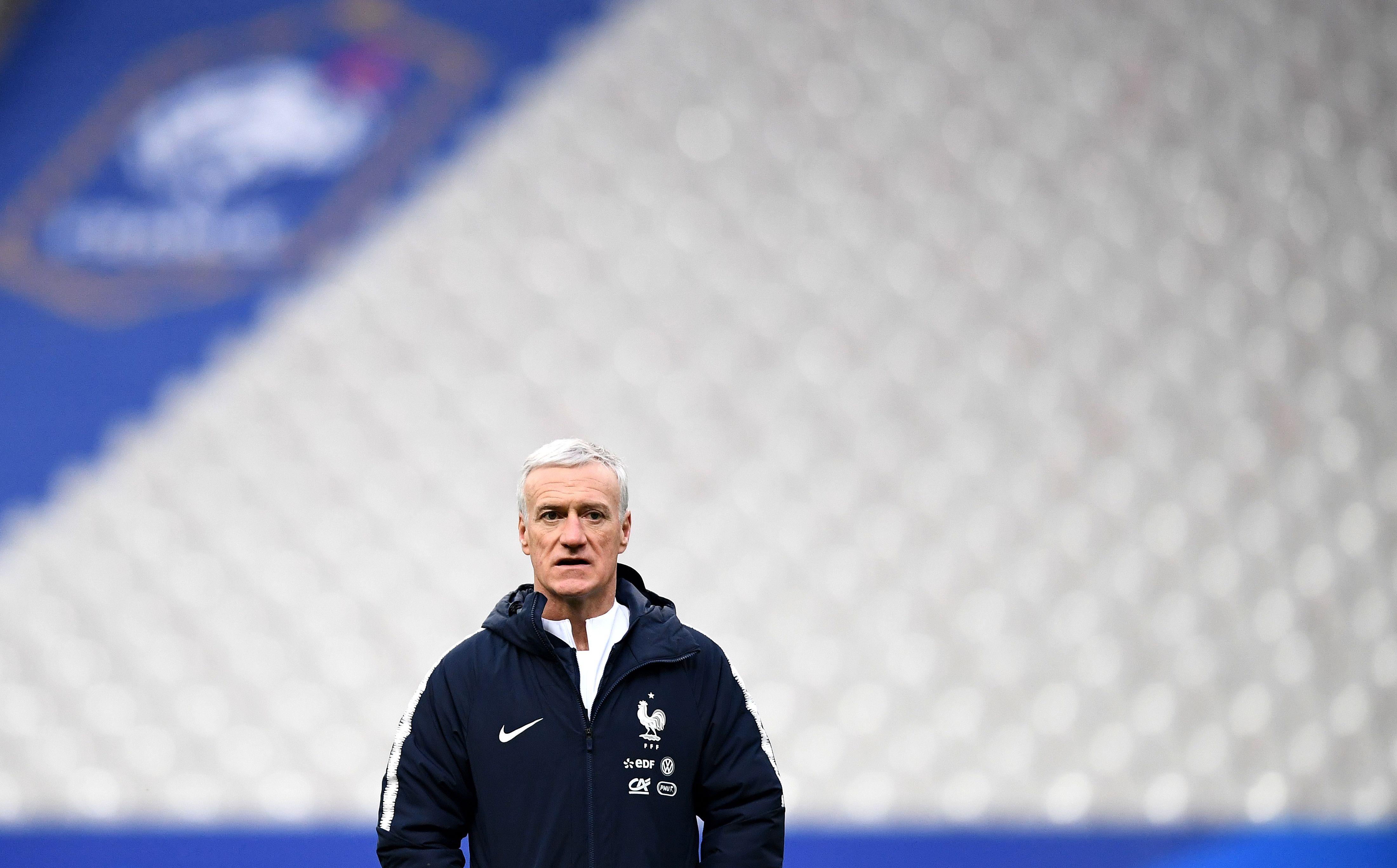 France's head coach Didier Deschamps looks on during a training session at the Stade de France in Saint-Denis, northern Paris, on March 22, 2018 on the eve of the international friendly football match against Colombia. / AFP PHOTO / FRANCK FIFE (Photo credit should read FRANCK FIFE/AFP/Getty Images)