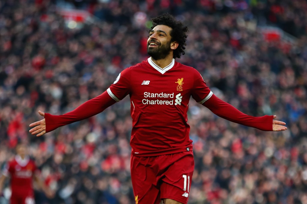 LIVERPOOL, ENGLAND - FEBRUARY 24: Mohamed Salah of Liverpool celebrates scoring his side's second goal during the Premier League match between Liverpool and West Ham United at Anfield on February 24, 2018 in Liverpool, England. (Photo by Clive Brunskill/Getty Images)