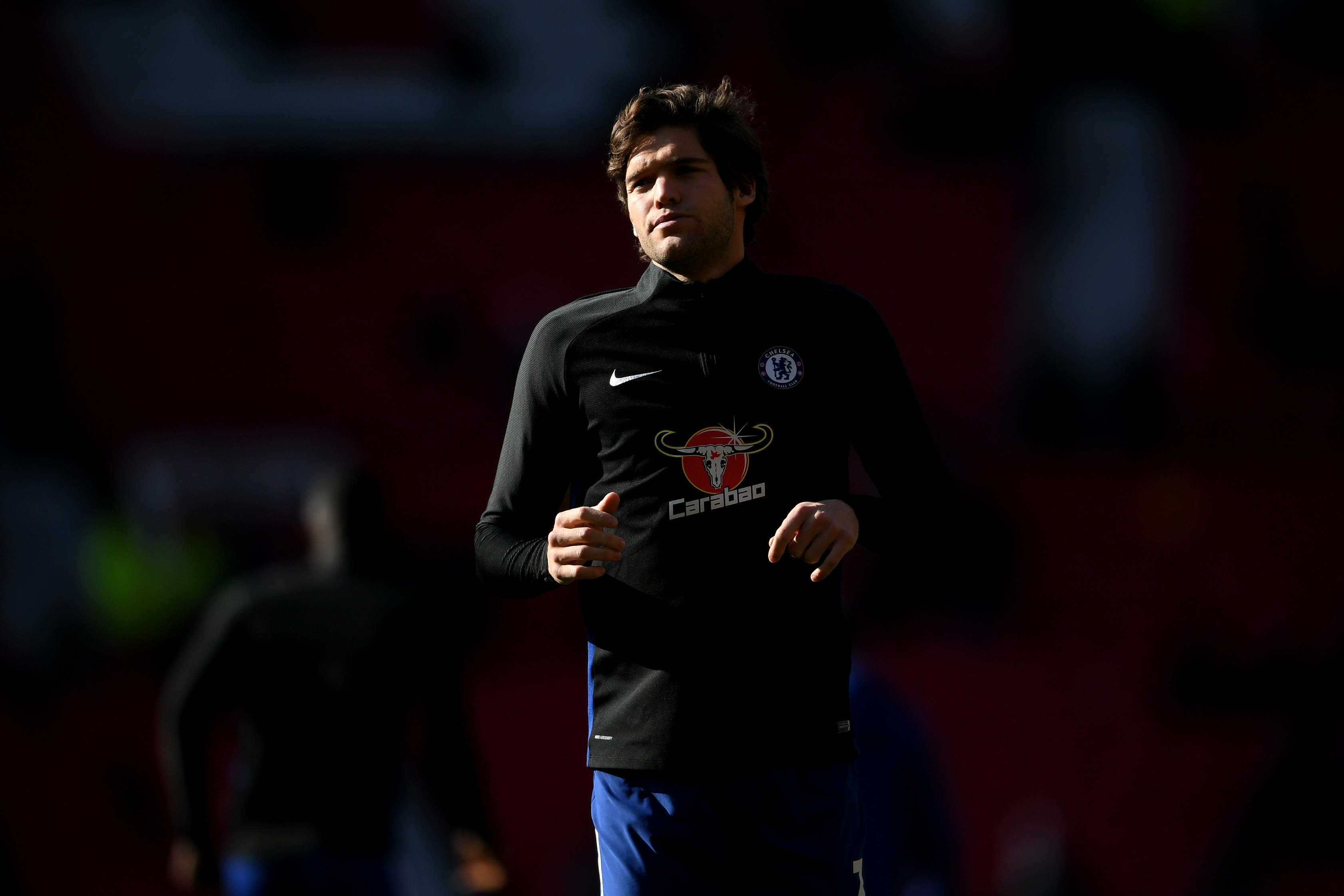 MANCHESTER, ENGLAND - FEBRUARY 25: Marcos Alonso of Chelsea warms up the Premier League match between Manchester United and Chelsea at Old Trafford on February 25, 2018 in Manchester, England. (Photo by Laurence Griffiths/Getty Images)