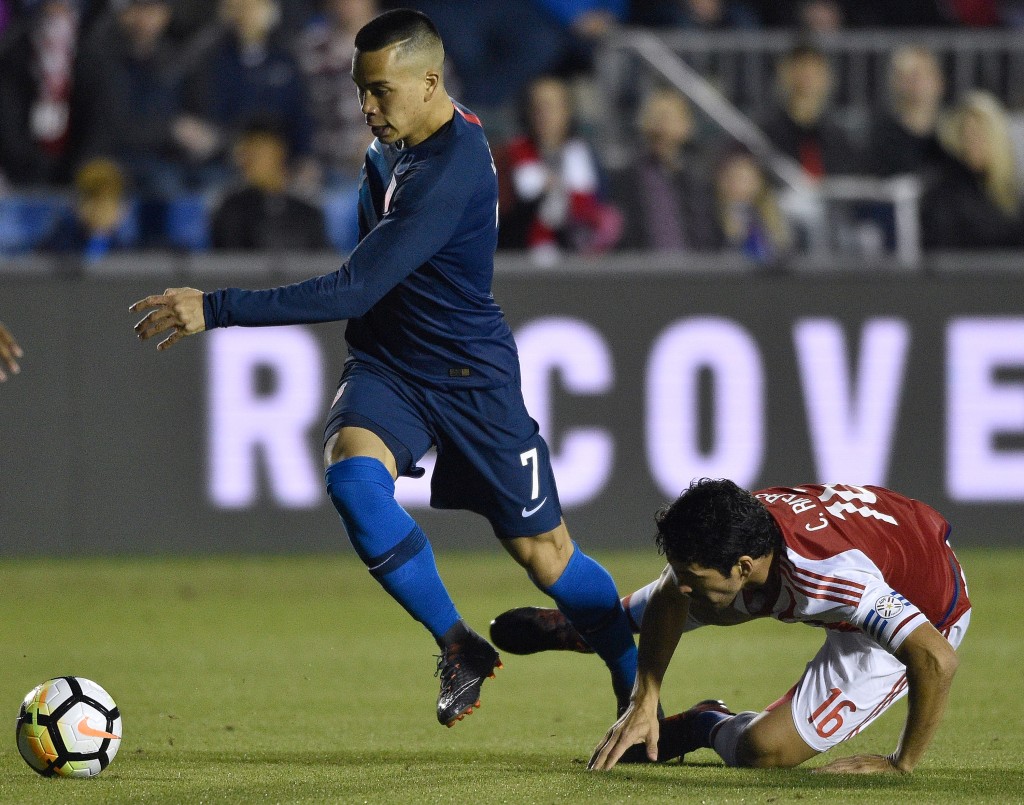 CARY, NC - MARCH 27: Bobby Wood #7 of United States battles Cristian Riveros #16 of Paraguay for the ball during their game at WakeMed Soccer Park on March 27, 2018 in Cary, North Carolina. (Photo by Grant Halverson/Getty Images)