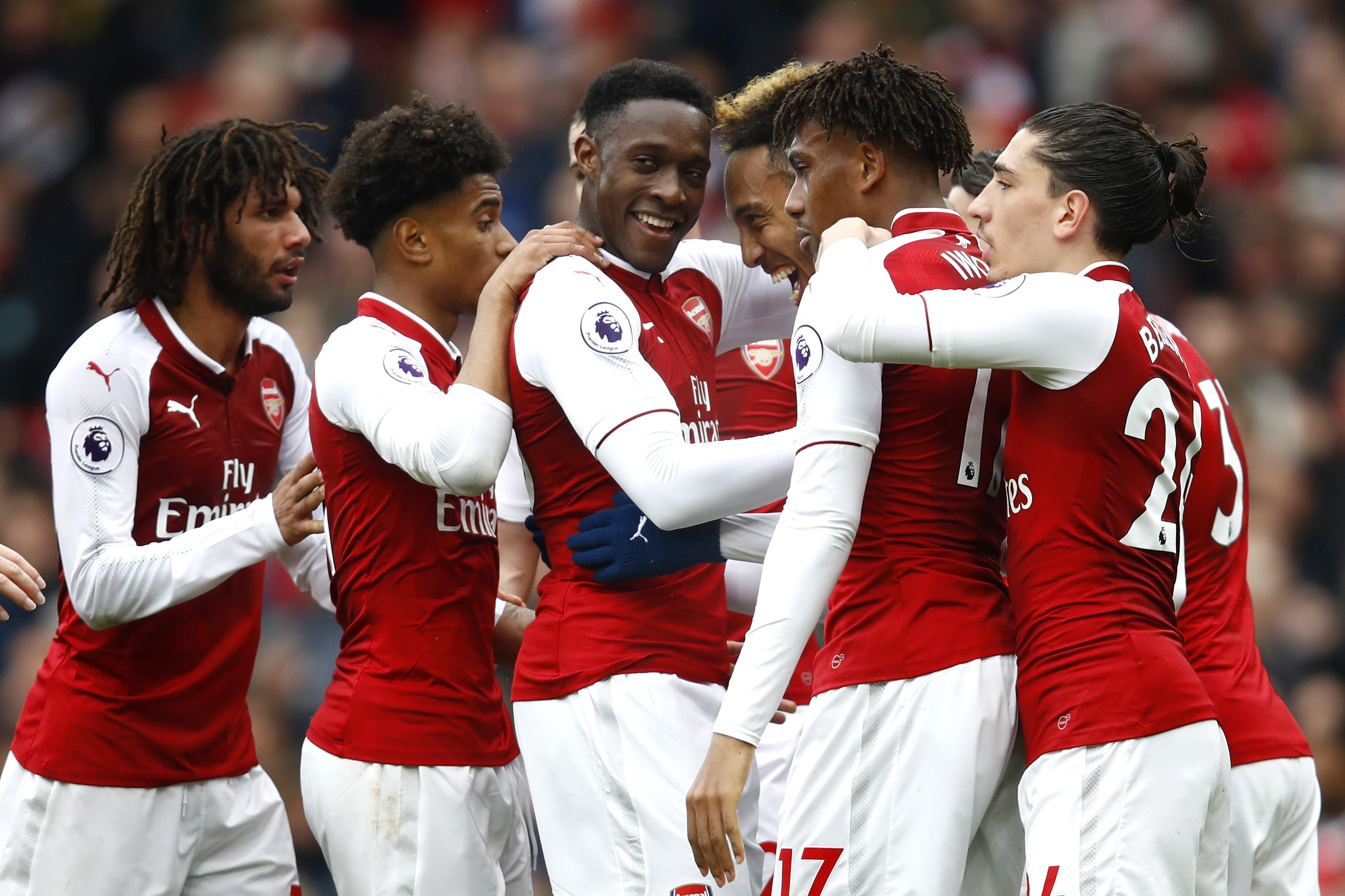 LONDON, ENGLAND - APRIL 08: Pierre-Emerick Aubameyang of Arsenal celebrates with team mates after scoring his sides first goal during the Premier League match between Arsenal and Southampton at Emirates Stadium on April 8, 2018 in London, England. (Photo by Julian Finney/Getty Images)