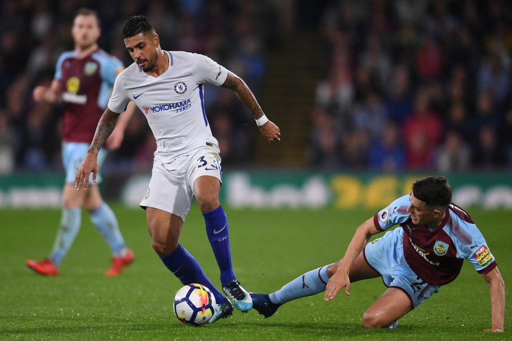 BURNLEY, ENGLAND - APRIL 19: Matthew Lowton of Burnley tackles Emerson Palmieri of Chelsea during the Premier League match between Burnley and Chelsea at Turf Moor on April 19, 2018 in Burnley, England. (Photo by Laurence Griffiths/Getty Images)