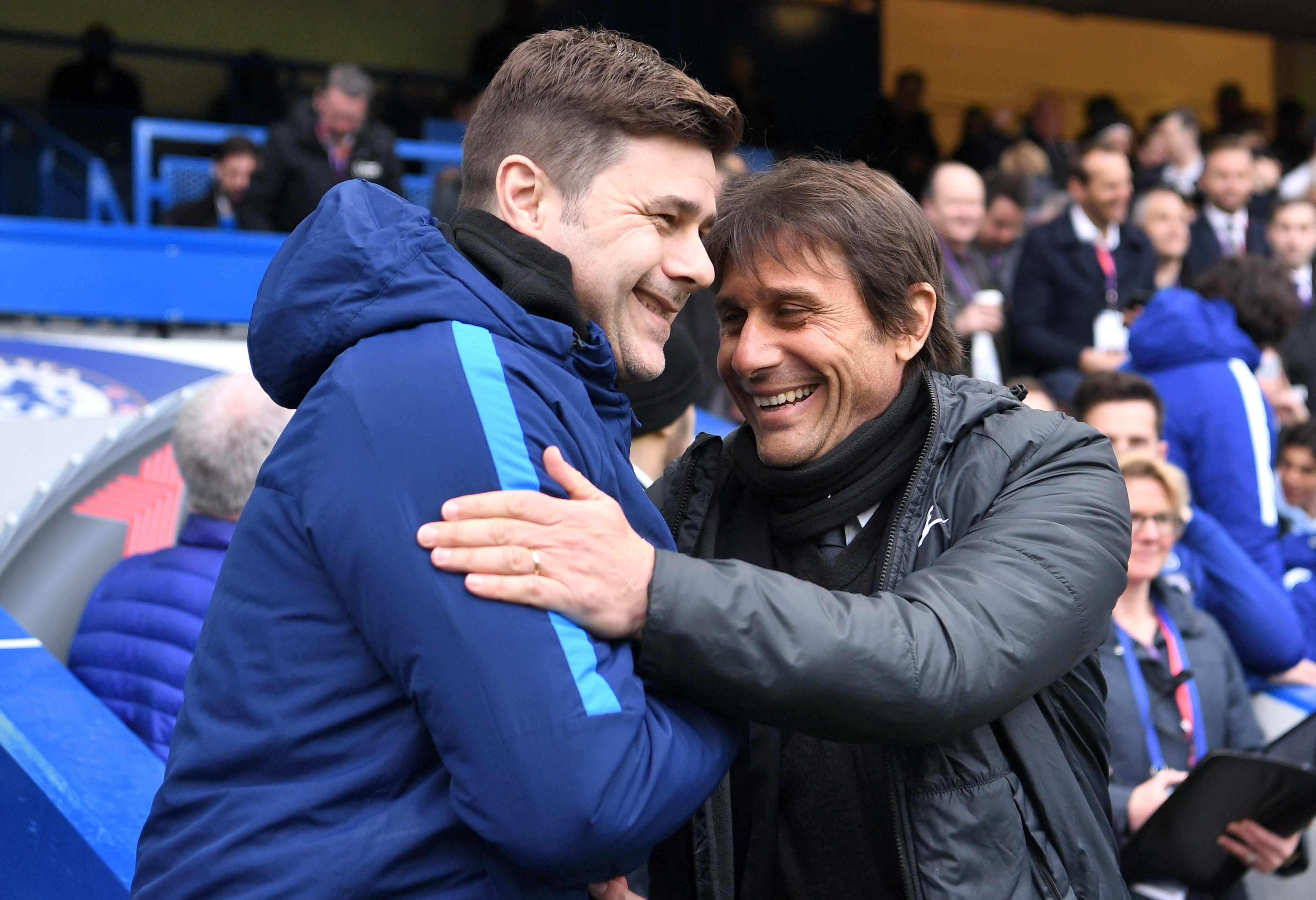 LONDON, ENGLAND - APRIL 01: Mauricio Pochettino, Manager of Tottenham Hotspur and Antonio Conte, Manager of Chlsea shake hands prior to the Premier League match between Chelsea and Tottenham Hotspur at Stamford Bridge on April 1, 2018 in London, England. (Photo by Michael Regan/Getty Images)