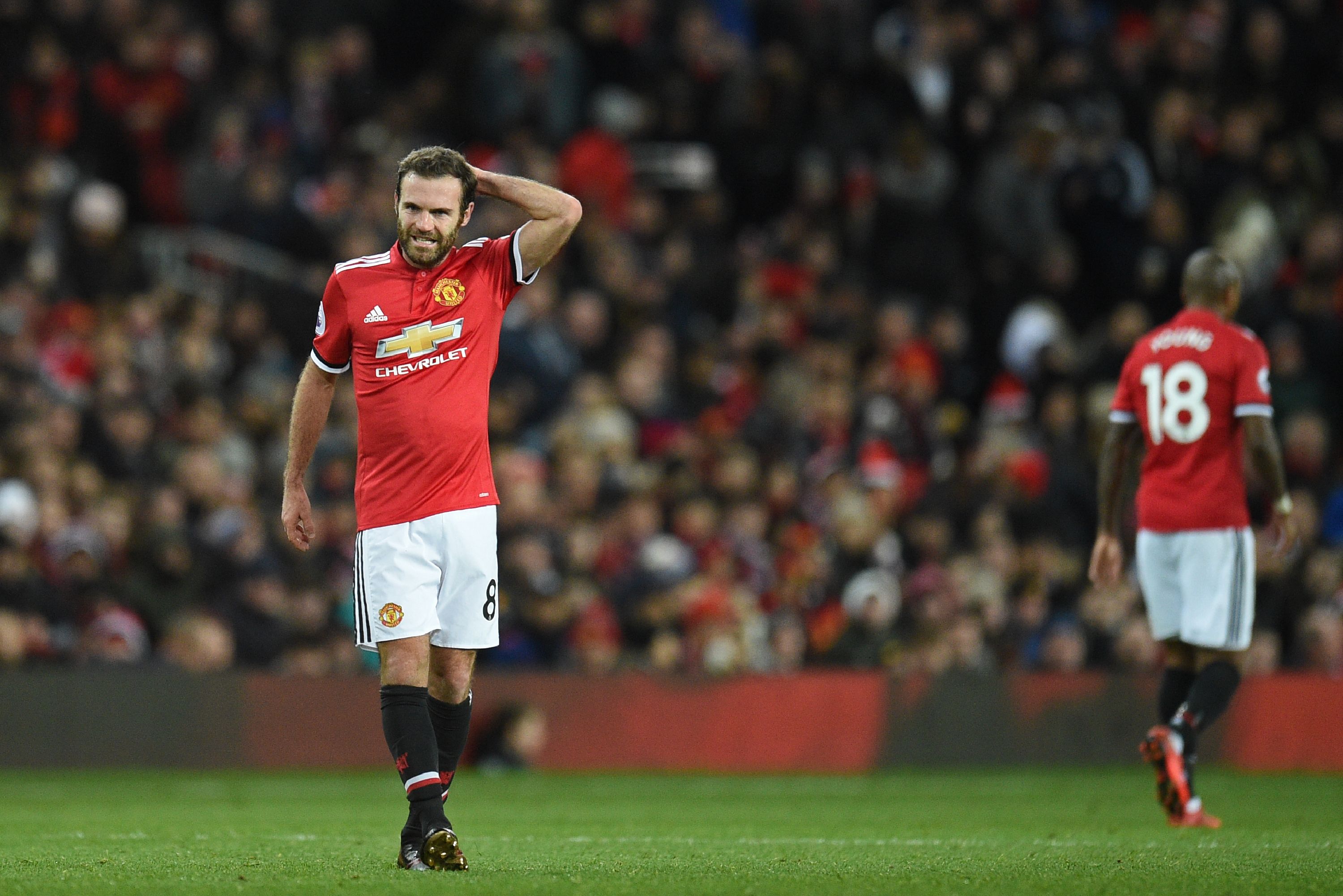 Manchester United's Spanish midfielder Juan Mata gestures during the English Premier League football match between Manchester United and Southampton at Old Trafford in Manchester, north west England, on December 30, 2017. / AFP PHOTO / Oli SCARFF / RESTRICTED TO EDITORIAL USE. No use with unauthorized audio, video, data, fixture lists, club/league logos or 'live' services. Online in-match use limited to 75 images, no video emulation. No use in betting, games or single club/league/player publications. / (Photo credit should read OLI SCARFF/AFP/Getty Images)