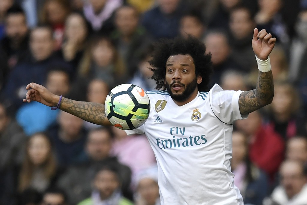 Real Madrid's Brazilian defender Marcelo controls the ball during the Spanish league football match between Real Madrid CF and Club Atletico de Madrid at the Santiago Bernabeu stadium in Madrid on April 8, 2018. / AFP PHOTO / GABRIEL BOUYS (Photo credit should read GABRIEL BOUYS/AFP/Getty Images)