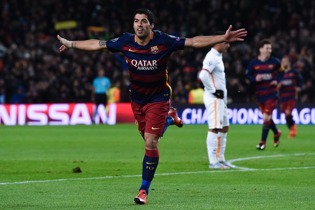 Barcelona's Uruguayan forward Luis Suarez celebrates after scoring during the UEFA Champions League Group E football match FC Barcelona vs AS Roma at the Camp Nou stadium in Barcelona on November 24, 2015. AFP PHOTO/ JOSEP LAGO / AFP / JOSEP LAGO (Photo credit should read JOSEP LAGO/AFP/Getty Images)