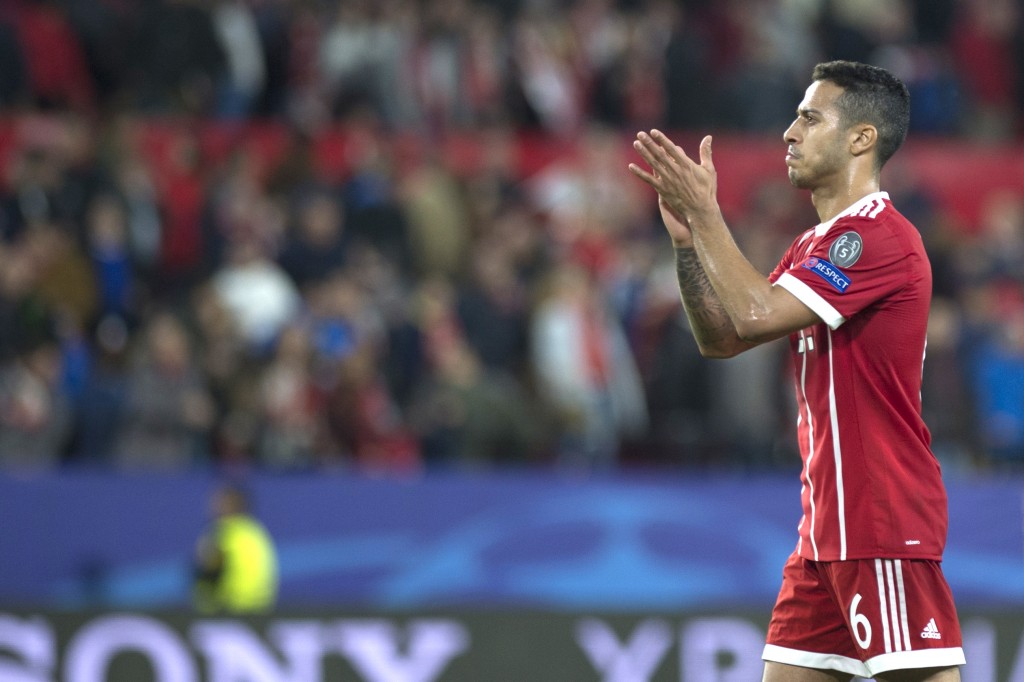 Bayern Munich's Spanish midfielder Thiago Alcantara applauds at the end the UEFA Champions League quarter-final first leg football match between Sevilla FC and Bayern Munich at the Ramon Sanchez Pizjuan Stadium in Sevilla on April 3, 2018. / AFP PHOTO / JORGE GUERRERO (Photo credit should read JORGE GUERRERO/AFP/Getty Images)