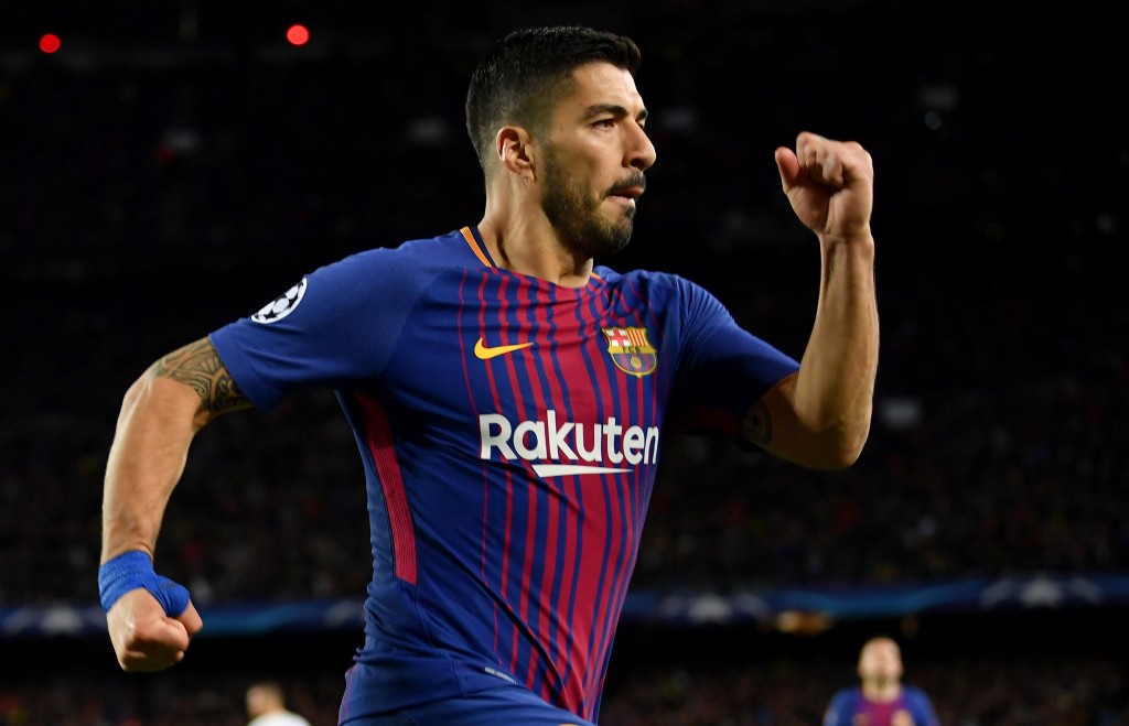 BARCELONA, SPAIN - APRIL 04: Luis Suarez of Barcelona celebrates after scoring his sides fourth goal during the UEFA Champions League Quarter Final Leg One match between FC Barcelona and AS Roma at Camp Nou on April 4, 2018 in Barcelona, Spain. (Photo by Stuart Franklin/Getty Images)