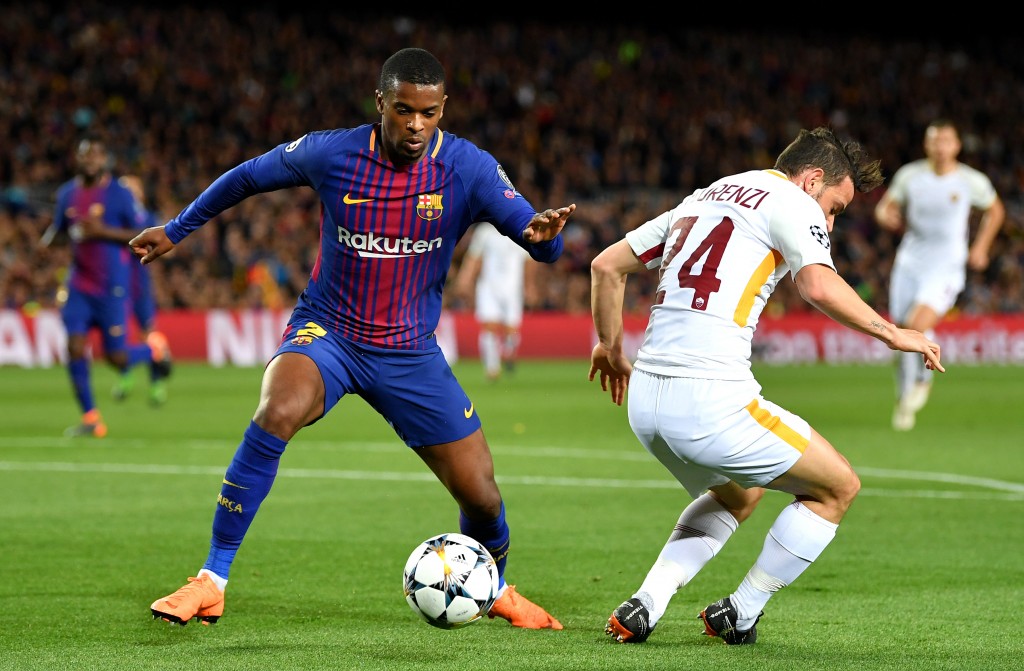 BARCELONA, SPAIN - APRIL 04: Nelson Semedo of Barcelona is challenged by Patrik Schick of AS Roma during the UEFA Champions League Quarter Final Leg One match between FC Barcelona and AS Roma at Camp Nou on April 4, 2018 in Barcelona, Spain. (Photo by Stuart Franklin/Getty Images)