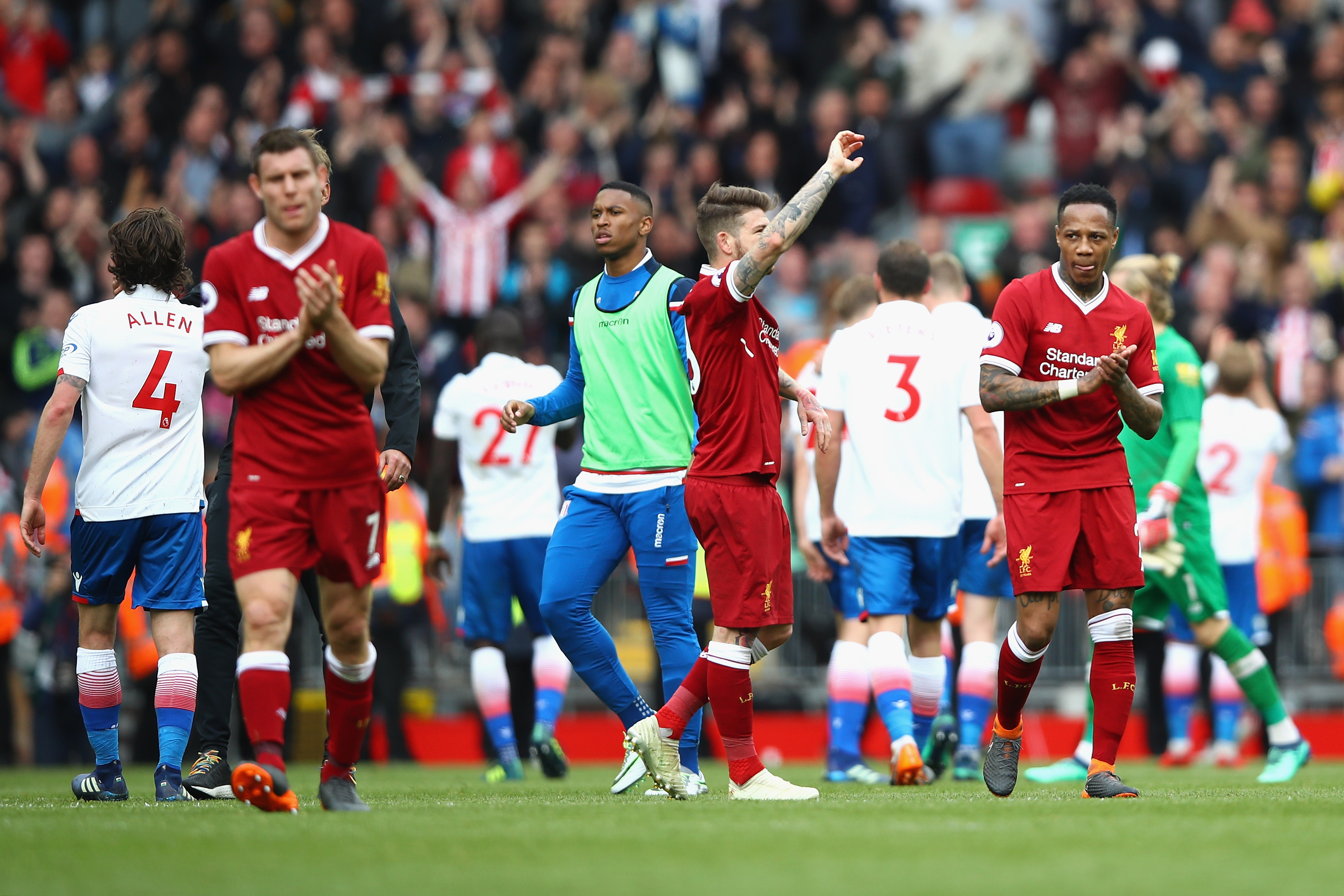 LIVERPOOL, ENGLAND - APRIL 28: Nathaniel Clyne of Liverpool applauds fans during the Premier League match between Liverpool and Stoke City at Anfield on April 28, 2018 in Liverpool, England. (Photo by Clive Brunskill/Getty Images)