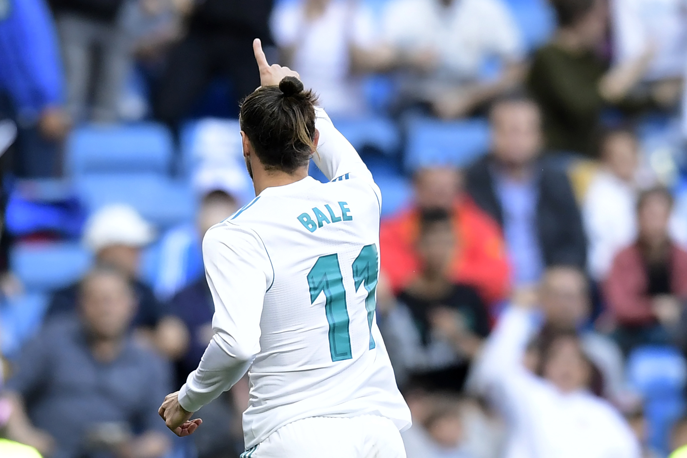 Real Madrid's Welsh forward Gareth Bale celebrates after scoring a goal during the Spanish League football match between Real Madrid and Leganes at the Santiago Bernabeu Stadium in Madrid on April 28, 2018. (Photo by JAVIER SORIANO / AFP) (Photo credit should read JAVIER SORIANO/AFP/Getty Images)