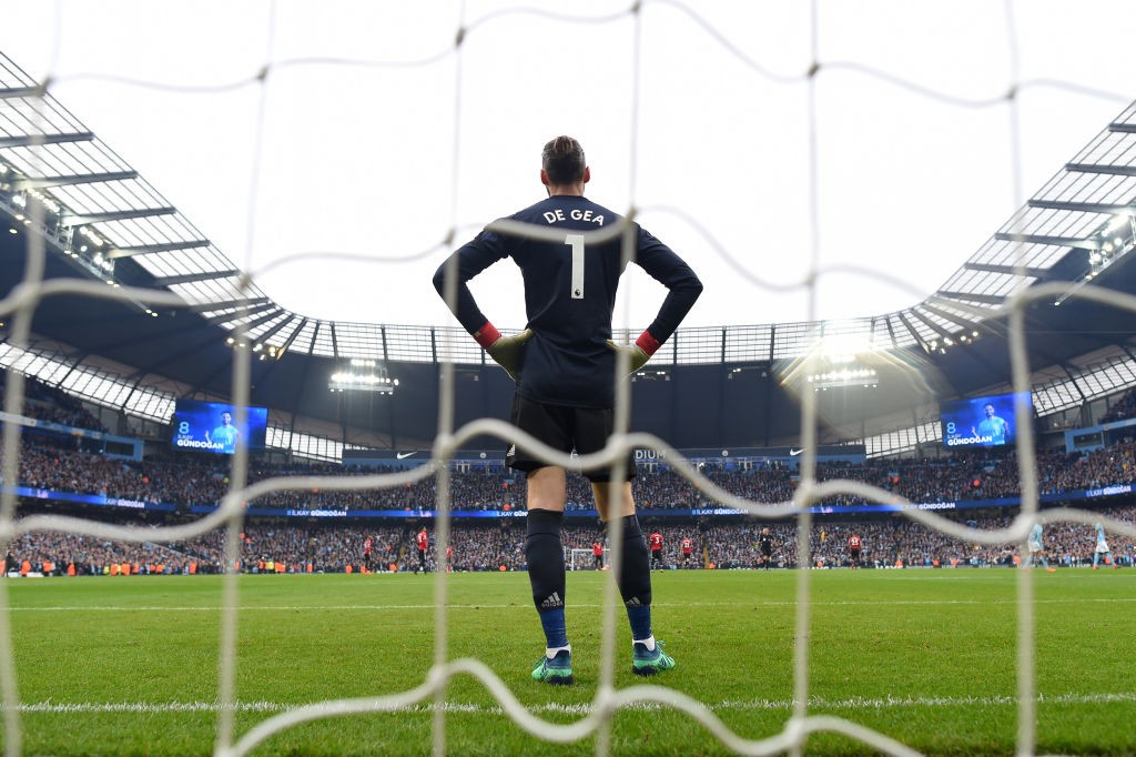 MANCHESTER, ENGLAND - APRIL 07: David De Gea of Manchester United looks dejected following Manchester City's second goal during the Premier League match between Manchester City and Manchester United at Etihad Stadium on April 7, 2018 in Manchester, England. (Photo by Michael Regan/Getty Images)