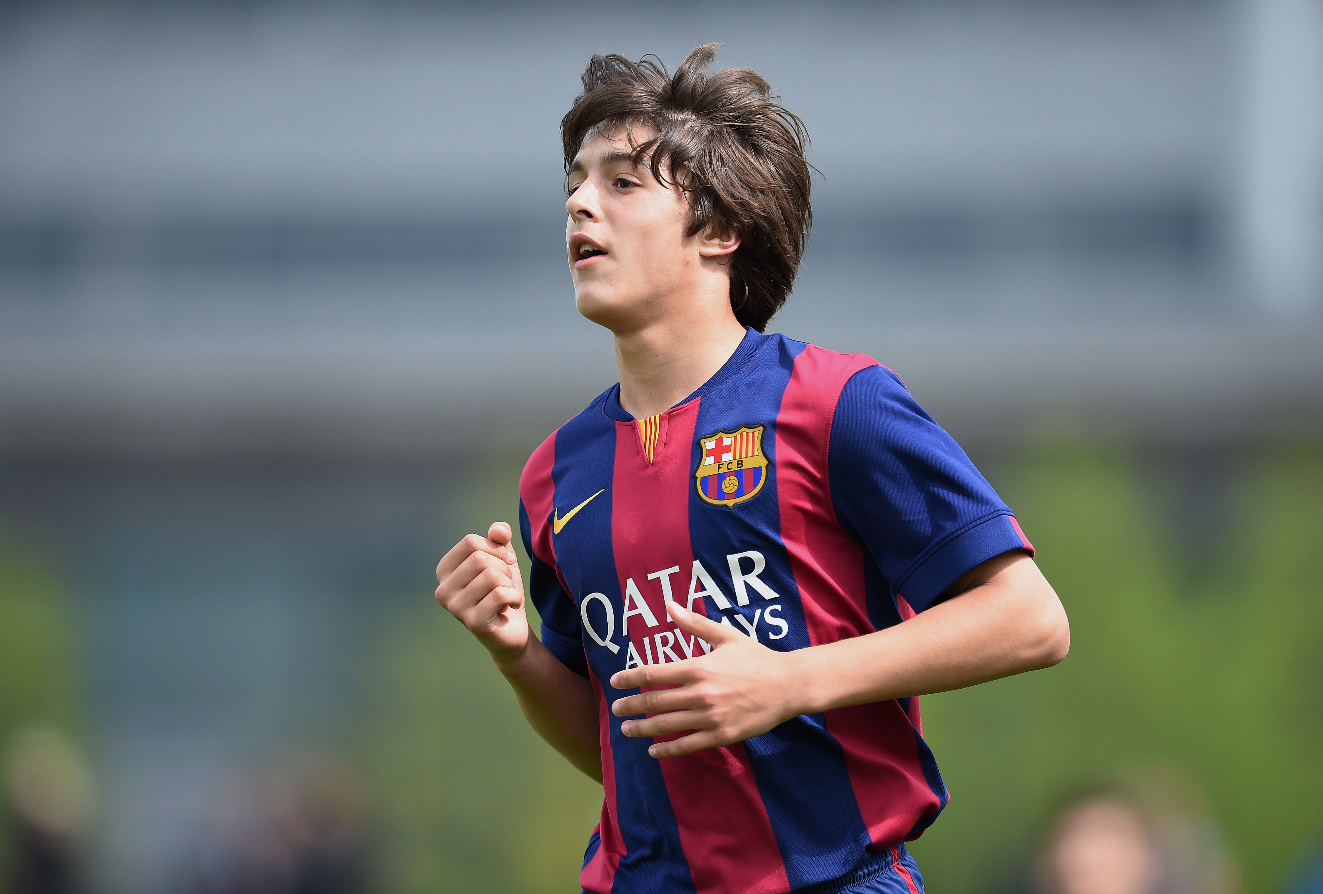 MOENCHENGLADBACH, GERMANY - APRIL 26:  Pablo Moreno Taboada of Barcelona celebrates  during the Final of the Santander Cup for U13 teams between FC Barcelona and VfB Stuttgart at Borussia Park Fohlenplatz on April 26, 2015 in Moenchengladbach, Germany.  (Photo by Matthias Hangst/Bongarts/Getty Images)