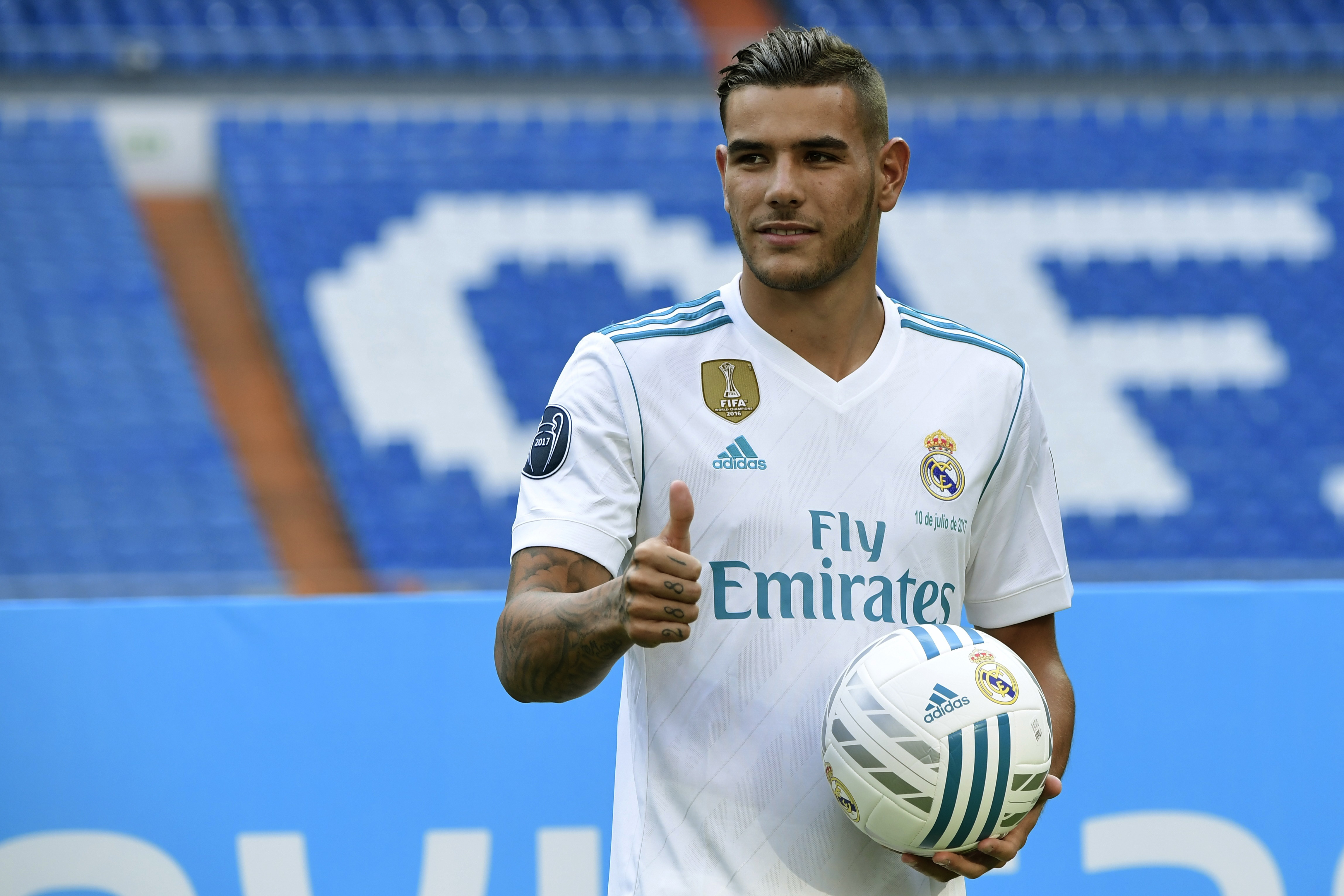 Real Madrid's French new player Theo Hernandez poses during his presentation at the Santiago Bernabeu stadium in Madrid, on July 10, 2017. / AFP PHOTO / JAVIER SORIANO (Photo credit should read JAVIER SORIANO/AFP/Getty Images)