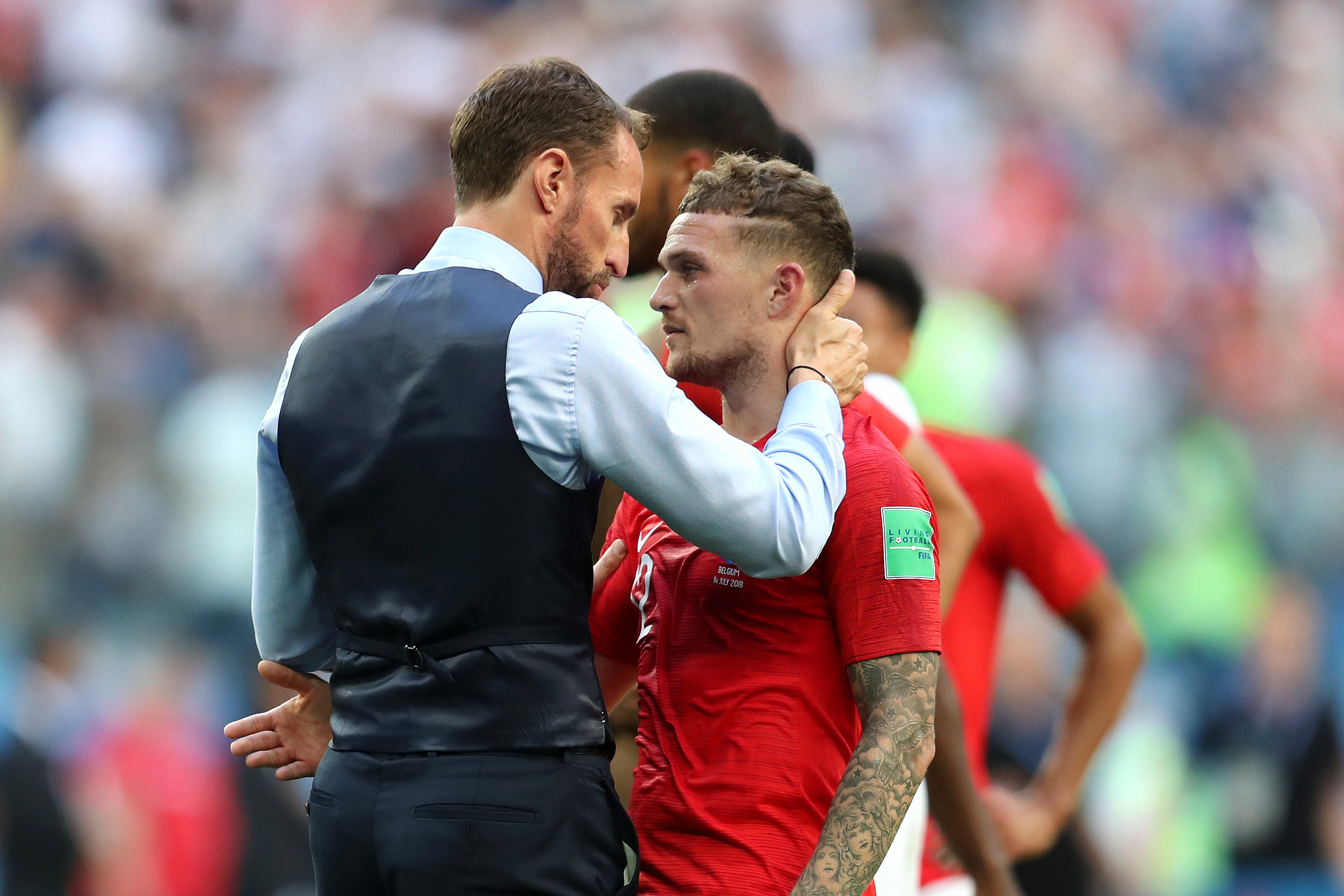 SAINT PETERSBURG, RUSSIA - JULY 14: Gareth Southgate, Manager of England speaks with Kieran Trippier of England after the 2018 FIFA World Cup Russia 3rd Place Playoff match between Belgium and England at Saint Petersburg Stadium on July 14, 2018 in Saint Petersburg, Russia. (Photo by Catherine Ivill/Getty Images)