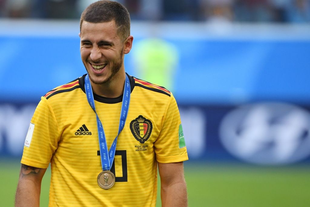 TOPSHOT - Belgium's forward Eden Hazard smiles after receiving his bronze medal following their Russia 2018 World Cup play-off for third place football match between Belgium and England at the Saint Petersburg Stadium in Saint Petersburg on July 14, 2018. (Photo by Paul ELLIS / AFP) / RESTRICTED TO EDITORIAL USE - NO MOBILE PUSH ALERTS/DOWNLOADS (Photo credit should read PAUL ELLIS/AFP/Getty Images)