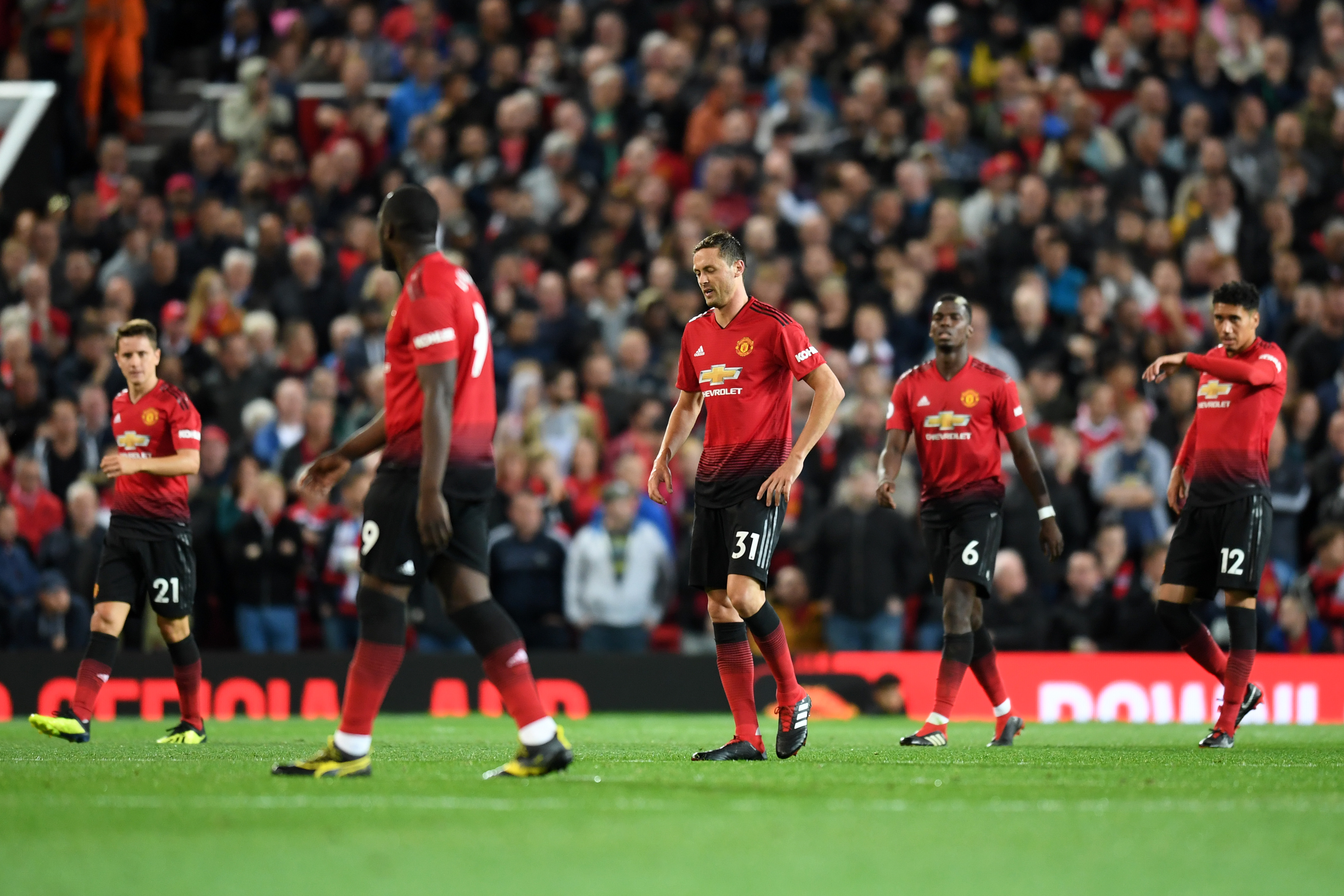 MANCHESTER, ENGLAND - AUGUST 27: Players of Manchester United looks dejected during the Premier League match between Manchester United and Tottenham Hotspur at Old Trafford on August 27, 2018 in Manchester, United Kingdom. (Photo by Michael Regan/Getty Images)