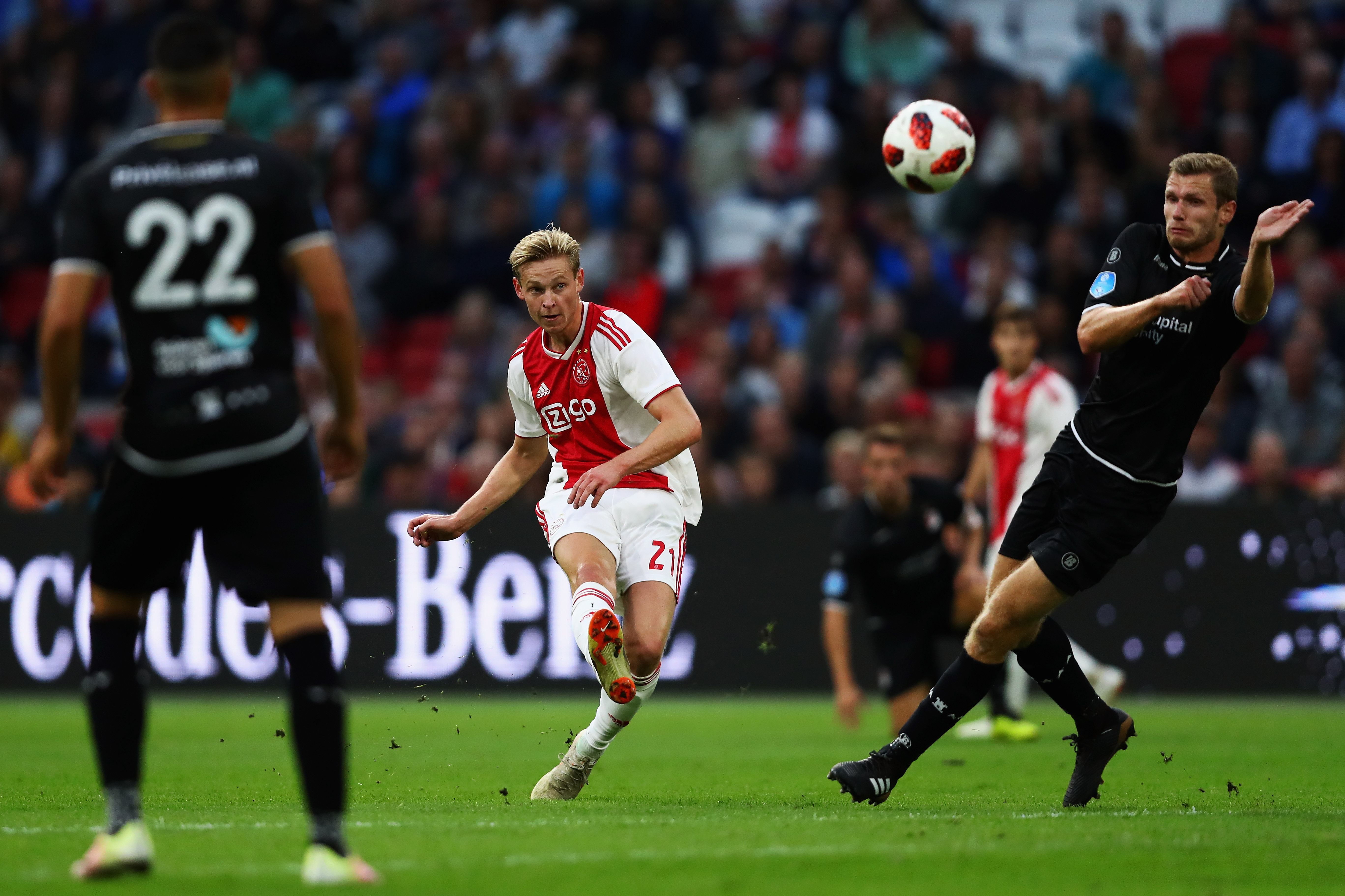 AMSTERDAM, NETHERLANDS - AUGUST 25:  Frenkie de Jong of Ajax shoots on goal during the Eredivisie match between Ajax and Emmen at Johan Cruyff Arena on August 25, 2018 in Amsterdam, Netherlands.  (Photo by Dean Mouhtaropoulos/Getty Images)
