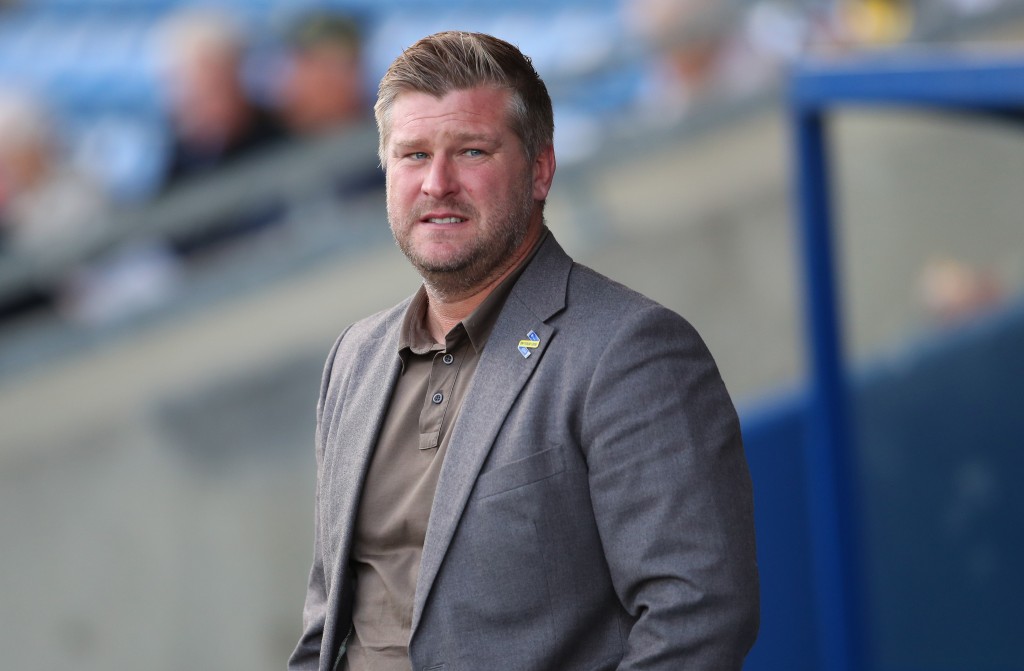 Can Karl Robinson & co. spring a surprise? (Photo courtesy - Catherine Ivill/Getty Images)
