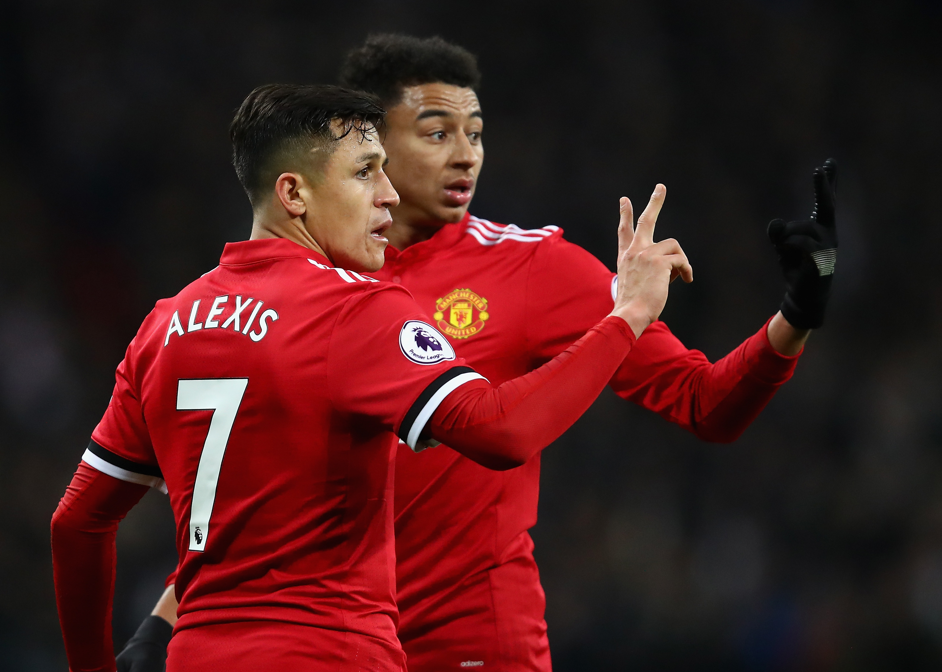LONDON, ENGLAND - JANUARY 31: Alexis Sanchez of Manchester United and Jesse Lingard of Manchester United line up a wall during the Premier League match between Tottenham Hotspur and Manchester United at Wembley Stadium on January 31, 2018 in London, England. (Photo by Julian Finney/Getty Images)