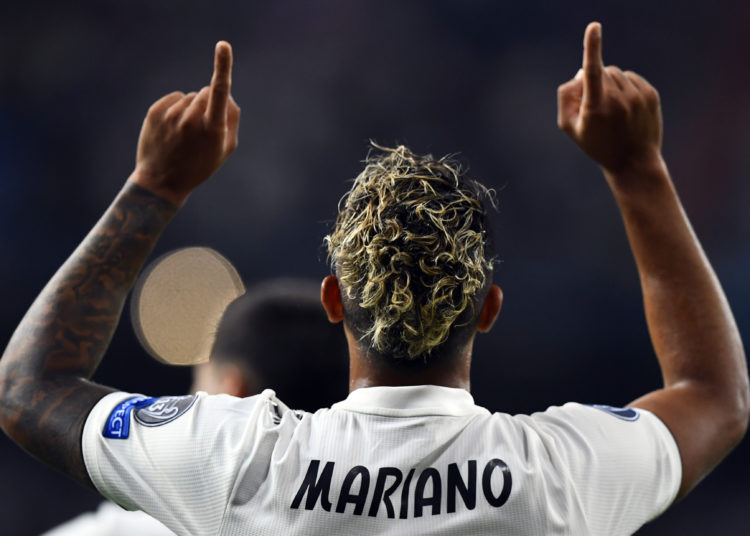 Real Madrid's Spanish-Dominican forward Mariano celebrates his goal during the UEFA Champions League group G football match between Real Madrid CF and AS Roma at the Santiago Bernabeu stadium in Madrid on September 19, 2018. (Photo by GABRIEL BOUYS / AFP) (Photo credit should read GABRIEL BOUYS/AFP/Getty Images)