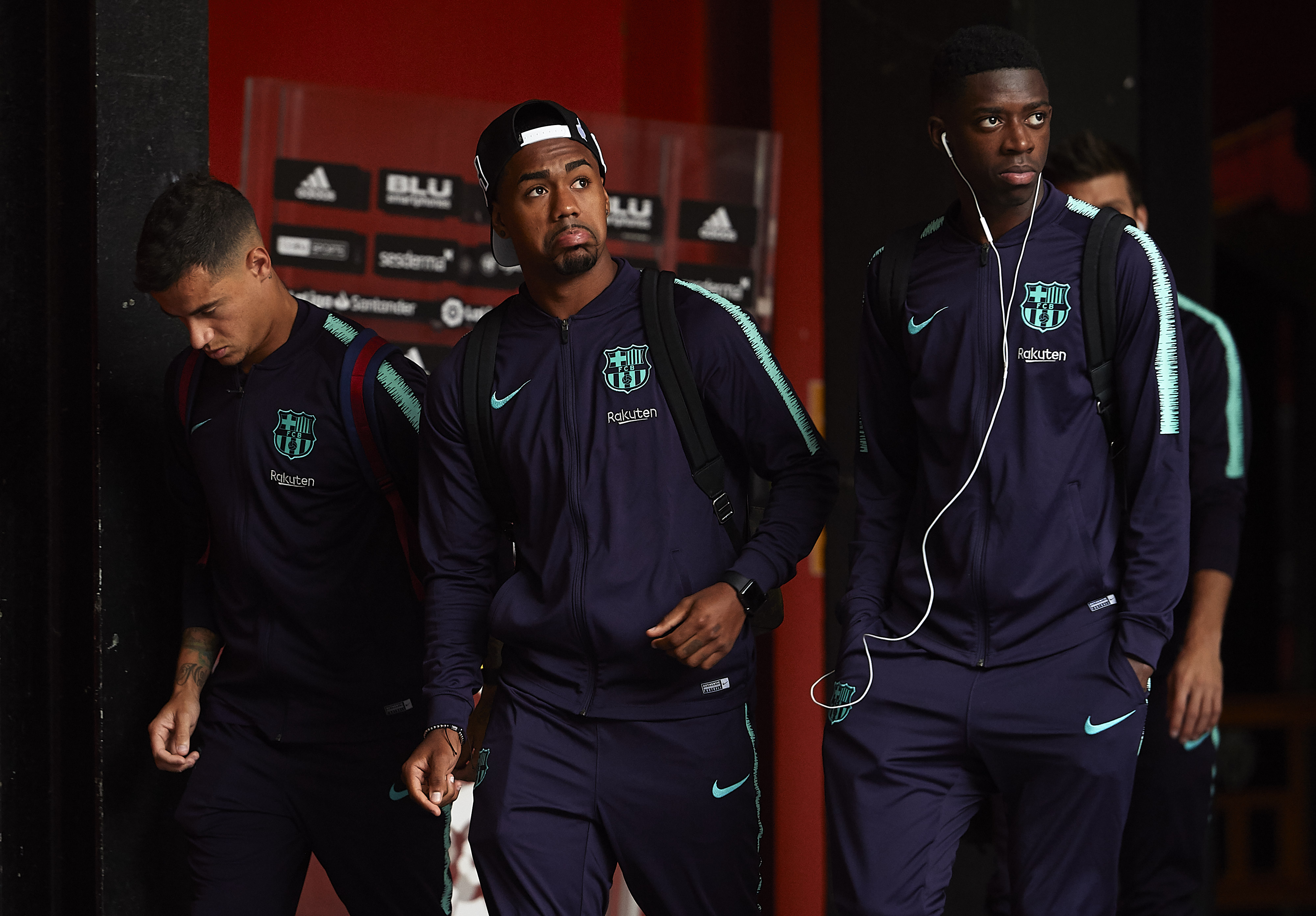 VALENCIA, SPAIN - OCTOBER 07:  (L-R) Philippe Coutinho, Malcom and Ousmane Dembele of Barcelona arrive for the La Liga match between Valencia CF and FC Barcelona at Estadio Mestalla on October 7, 2018 in Valencia, Spain.  (Photo by Manuel Queimadelos Alonso/Getty Images)