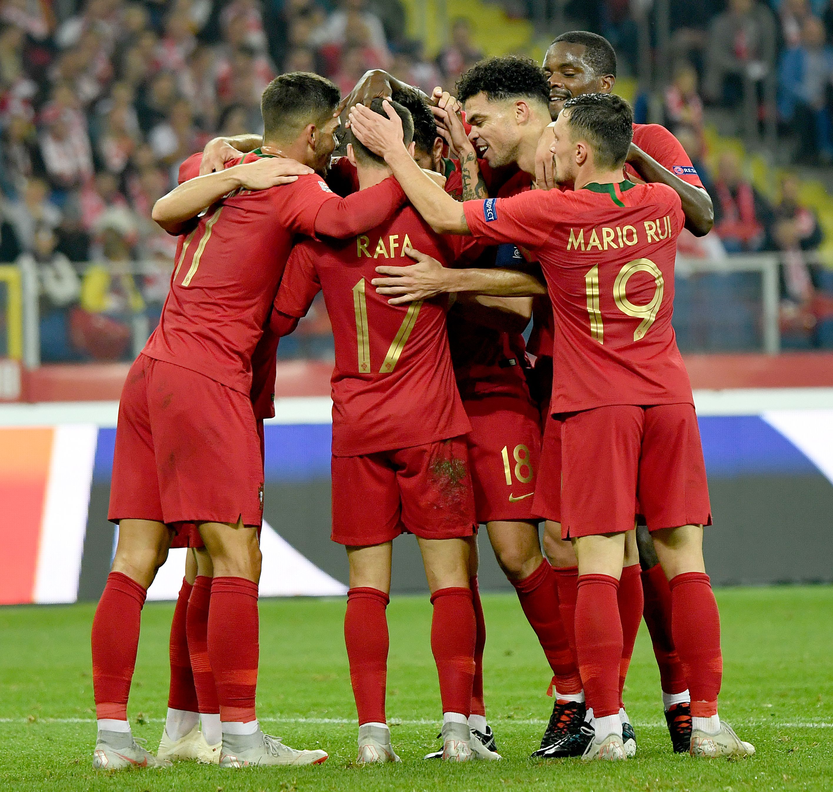 Portugal's forward Rafa Silva (C) celebrates scoring with his team-mates during the UEFA Nations League football match Poland v Portugal at the Slaski Stadium in Chorzow, Poland on October 11, 2018. (Photo by Janek SKARZYNSKI / AFP) (Photo credit should read JANEK SKARZYNSKI/AFP/Getty Images)