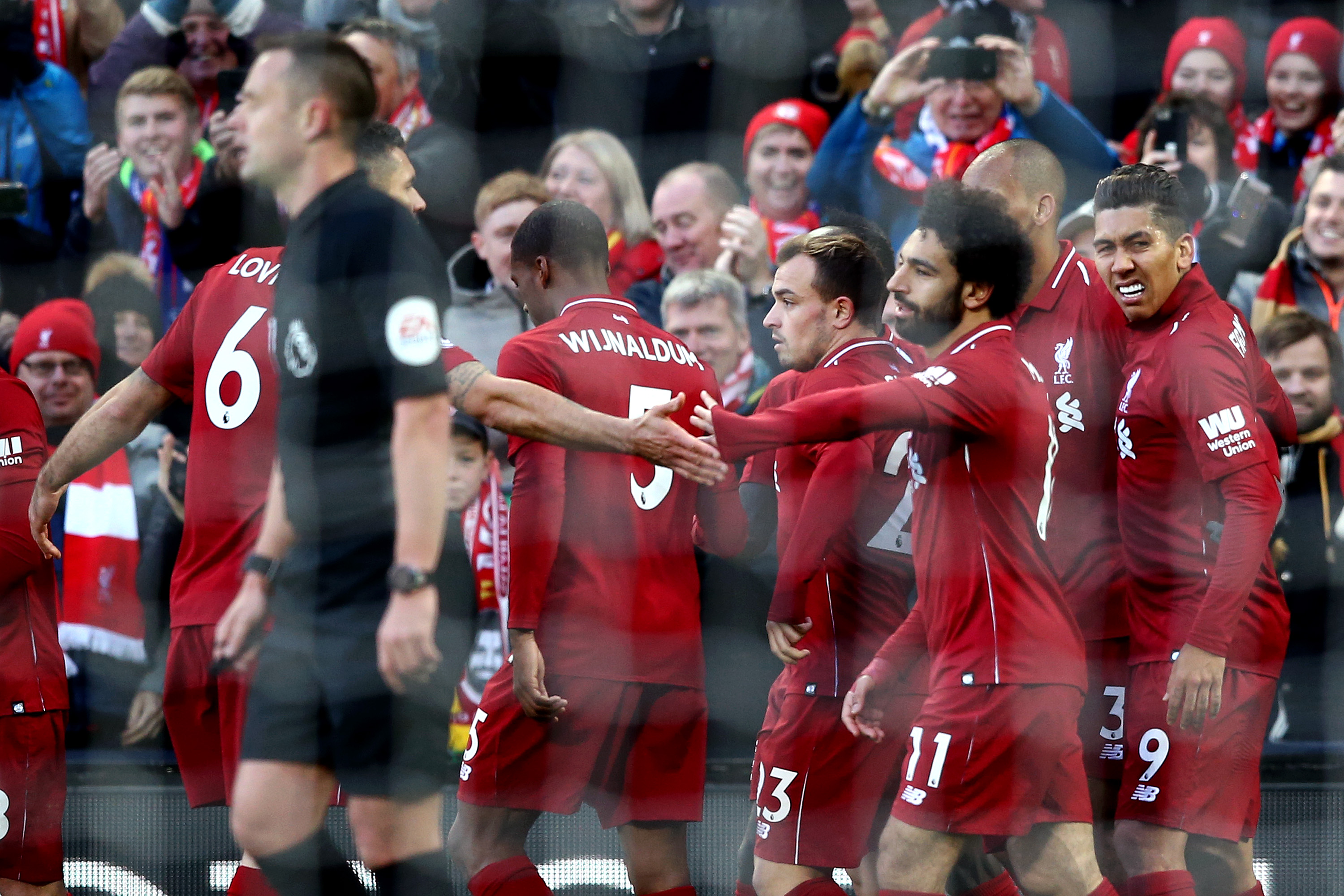 LIVERPOOL, ENGLAND - OCTOBER 27: Sadio Mane of Liverpool celebrates with teammates after scoring his team's second goal during the Premier League match between Liverpool FC and Cardiff City at Anfield on October 27, 2018 in Liverpool, United Kingdom. (Photo by Jan Kruger/Getty Images)