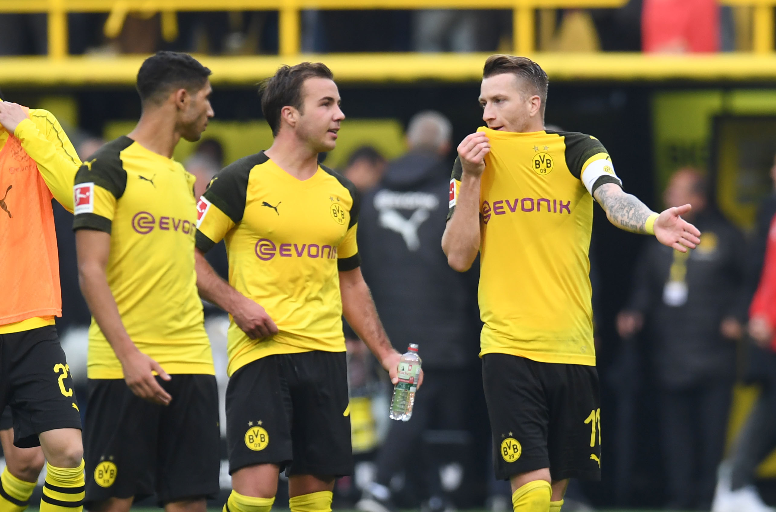 Dortmund's players react after the German first division Bundesliga football match Borussia Dortmund vs Hertha BSC Berlin in Dortmund, western Germany, on September 27, 2018. (Photo by Patrik STOLLARZ / AFP) / RESTRICTIONS: DFL REGULATIONS PROHIBIT ANY USE OF PHOTOGRAPHS AS IMAGE SEQUENCES AND/OR QUASI-VIDEO        (Photo credit should read PATRIK STOLLARZ/AFP/Getty Images)