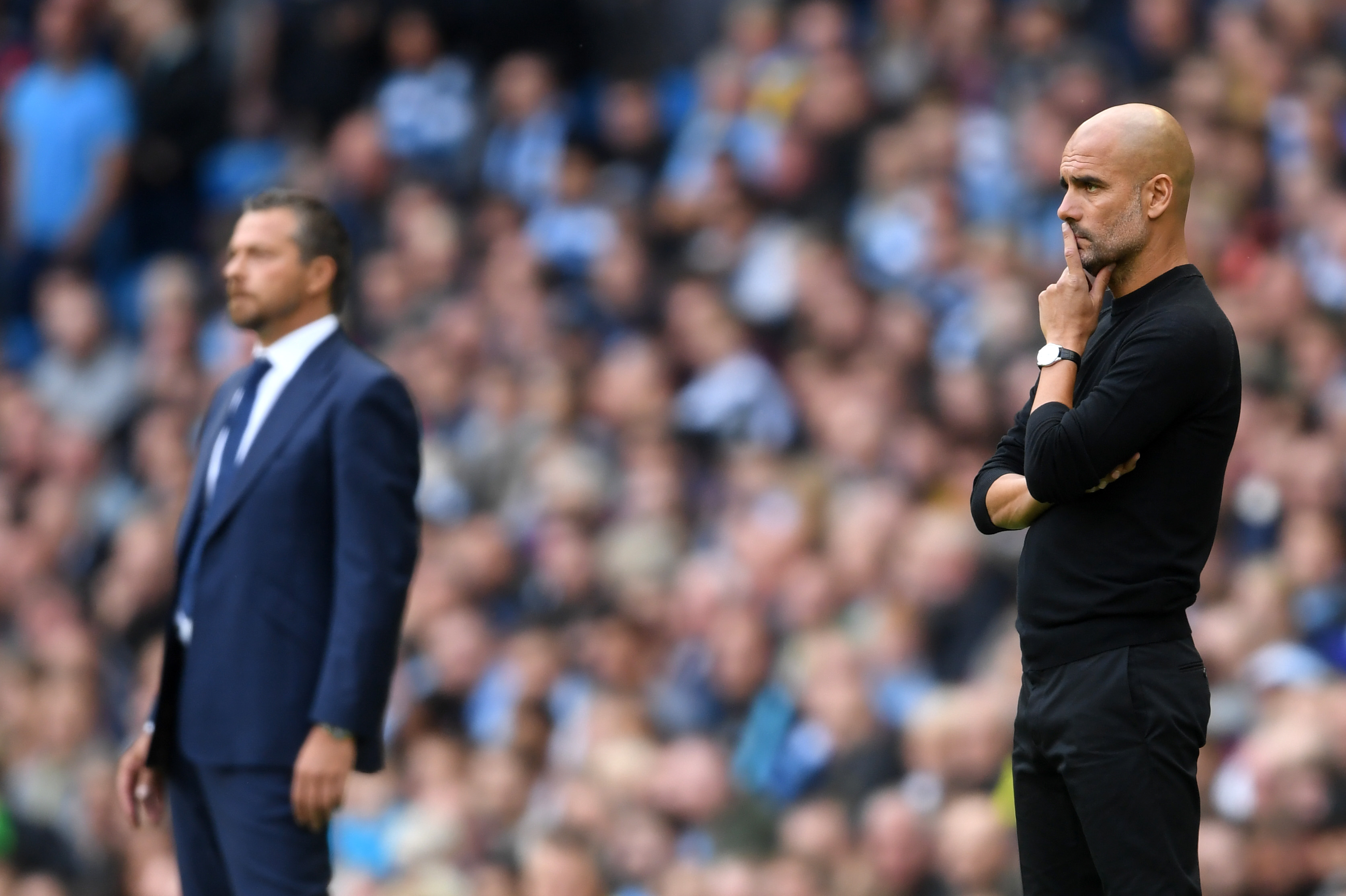 MANCHESTER, ENGLAND - SEPTEMBER 15: Josep Guardiola, Manager of Manchester City looks on during the Premier League match between Manchester City and Fulham FC at Etihad Stadium on September 15, 2018 in Manchester, United Kingdom. (Photo by Laurence Griffiths/Getty Images)